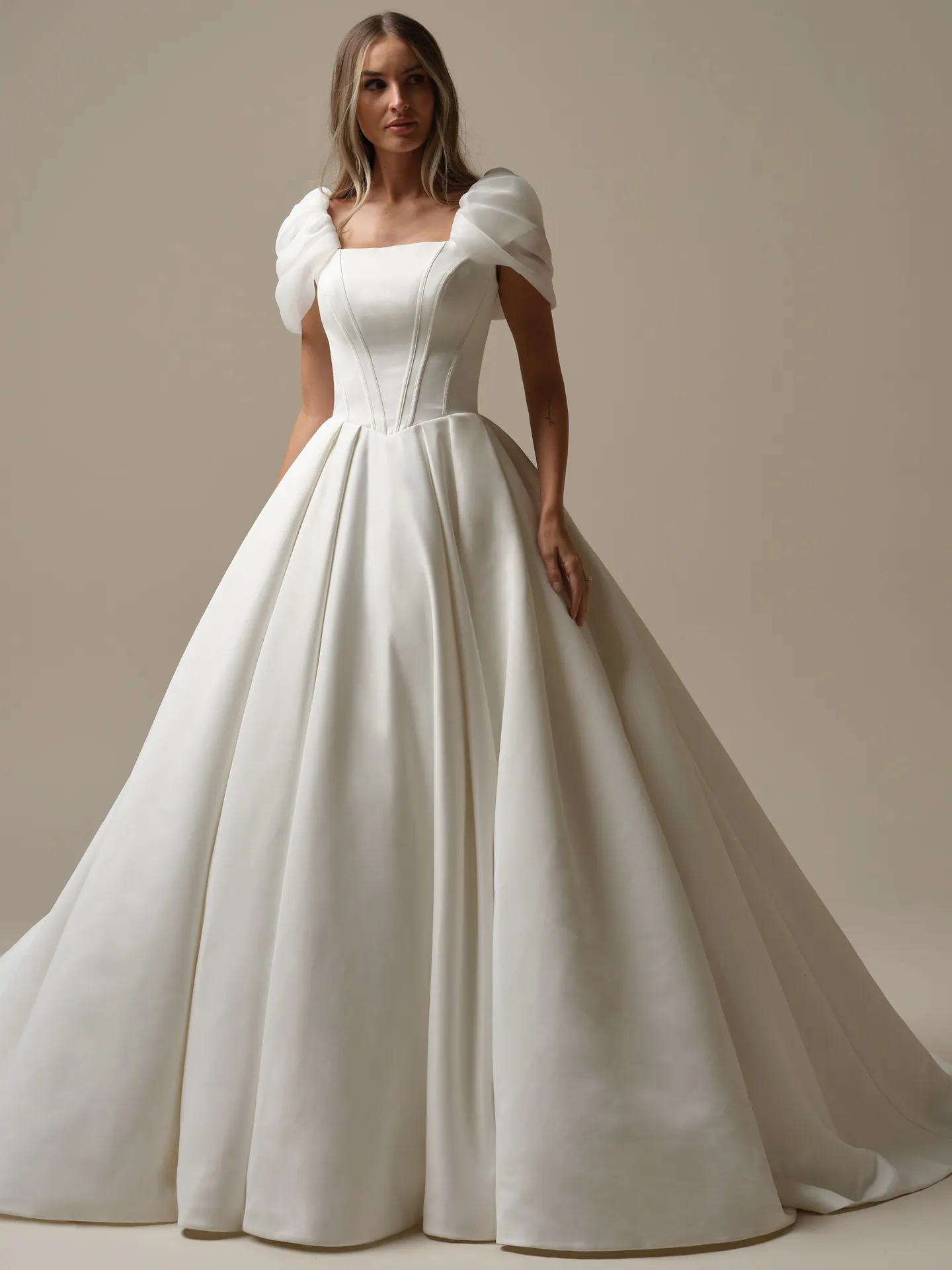 Maggie Sottero Derrick Leigh front view ball gown with puff sleeves
