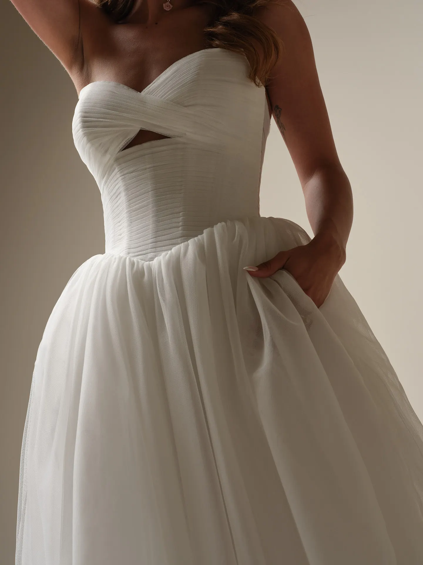 Maggie Sottero Evan pleated keyhole ballgown front view