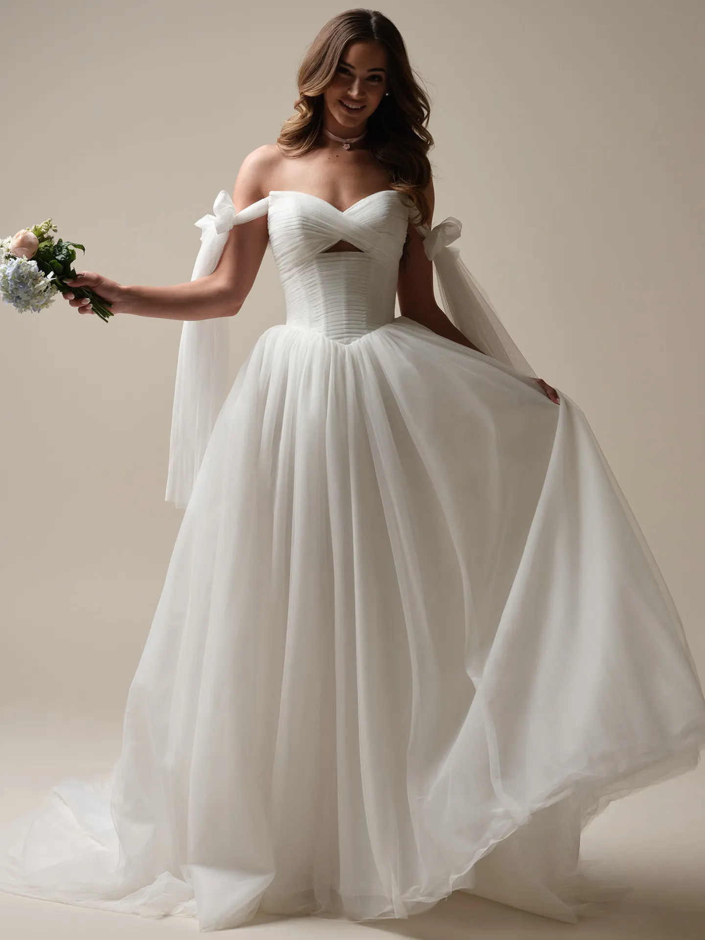 Evan ball gown front view with keyhole and pleated design, Maggie Sottero.