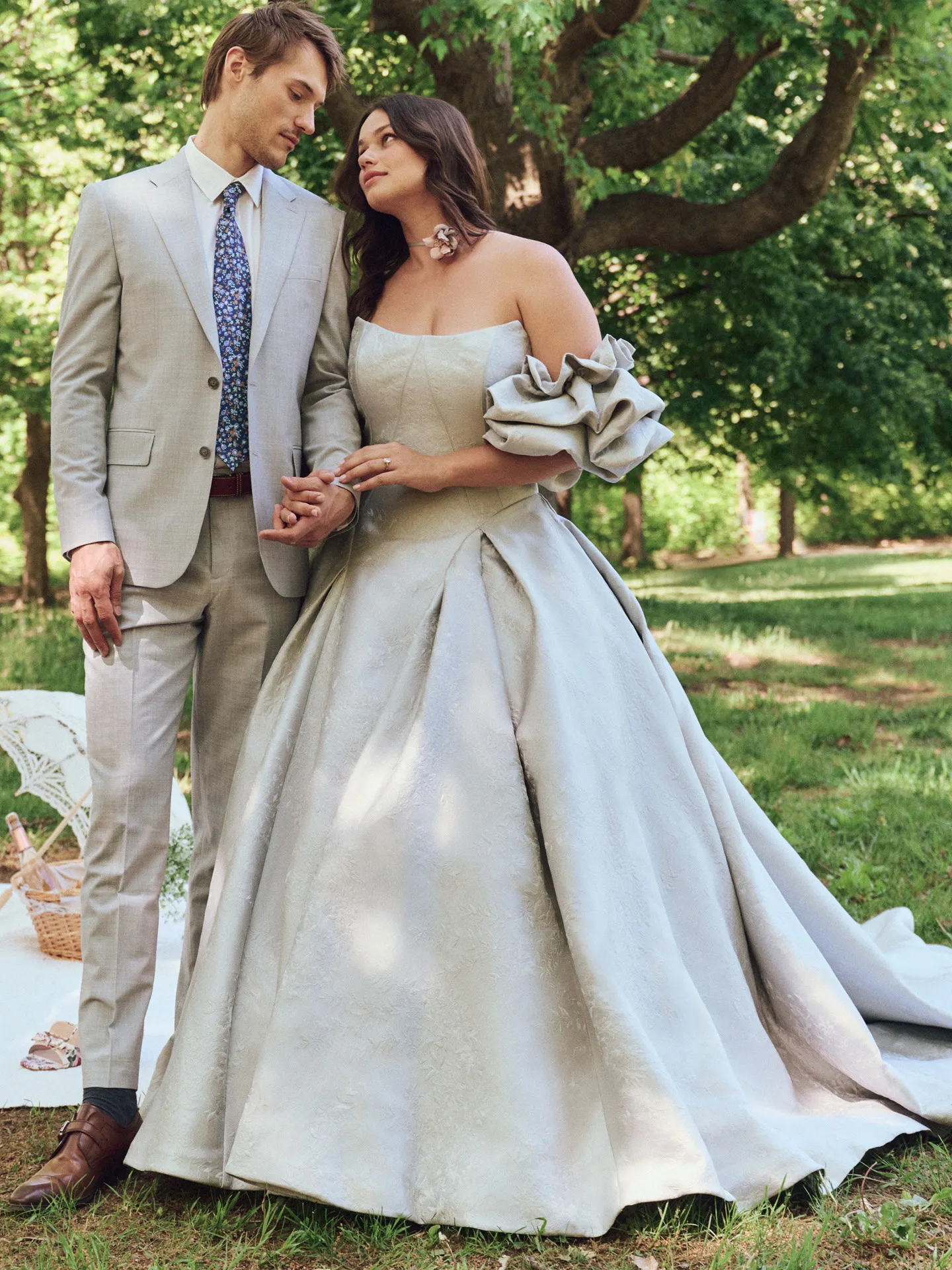 Maggie Sottero Fortune Marie jacquard ball gown front view in a garden setting