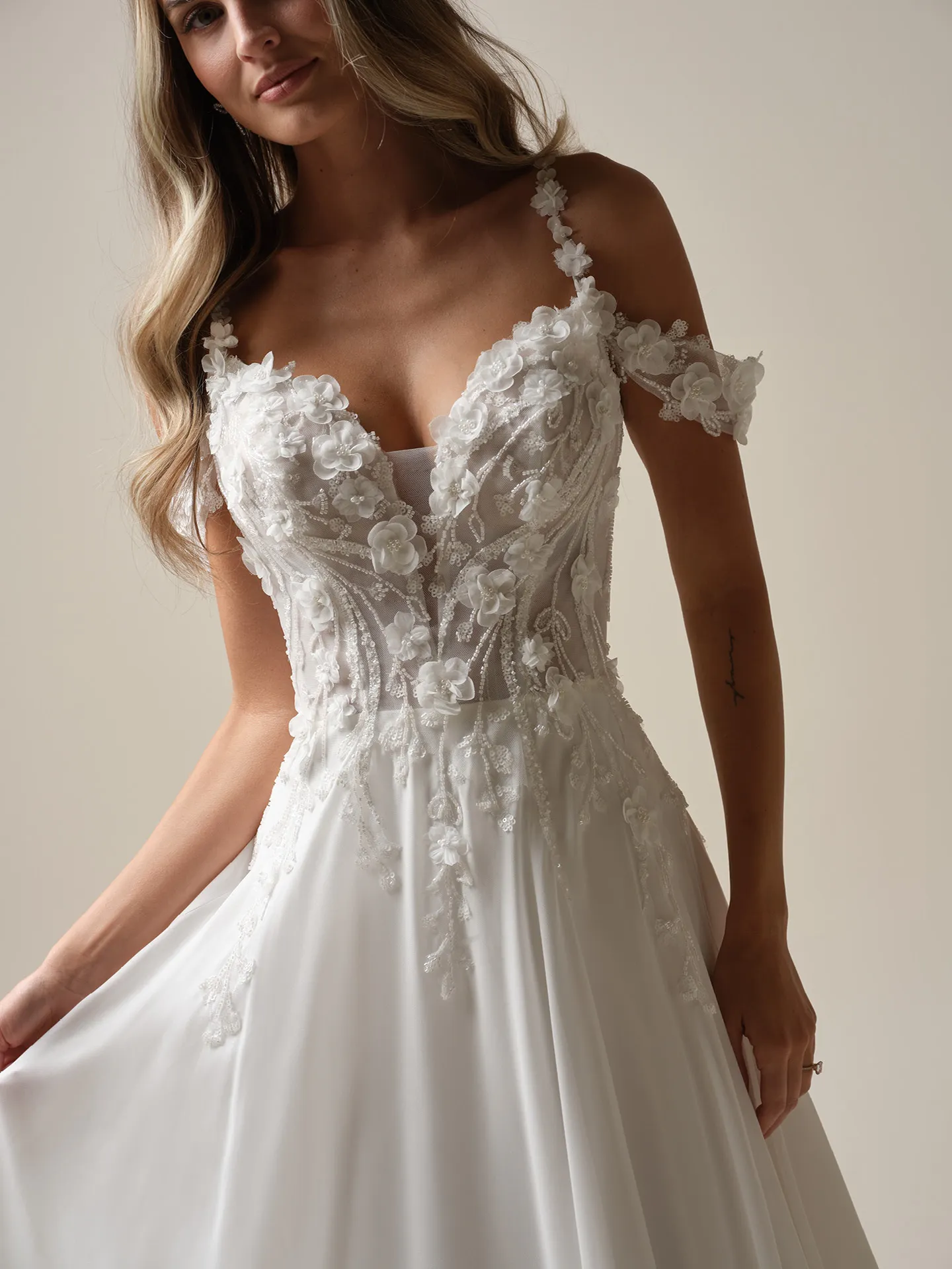 Maggie Sottero Hunter front view lace cap-sleeves 3D flowers