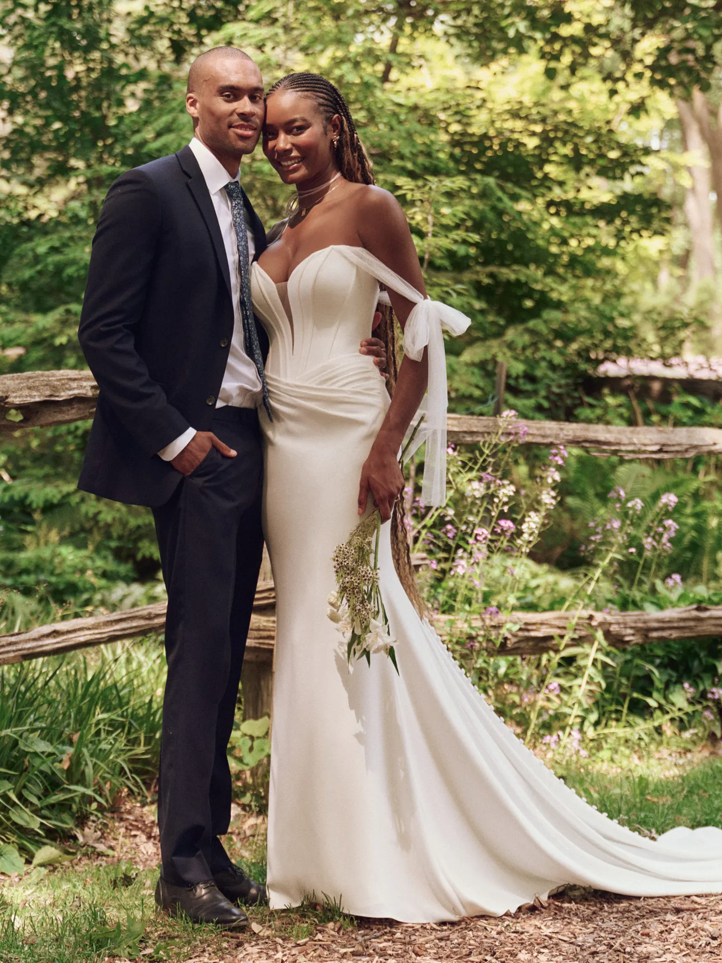 Maggie Sottero Jace front view, exposed boning, crepe sheath in garden setting