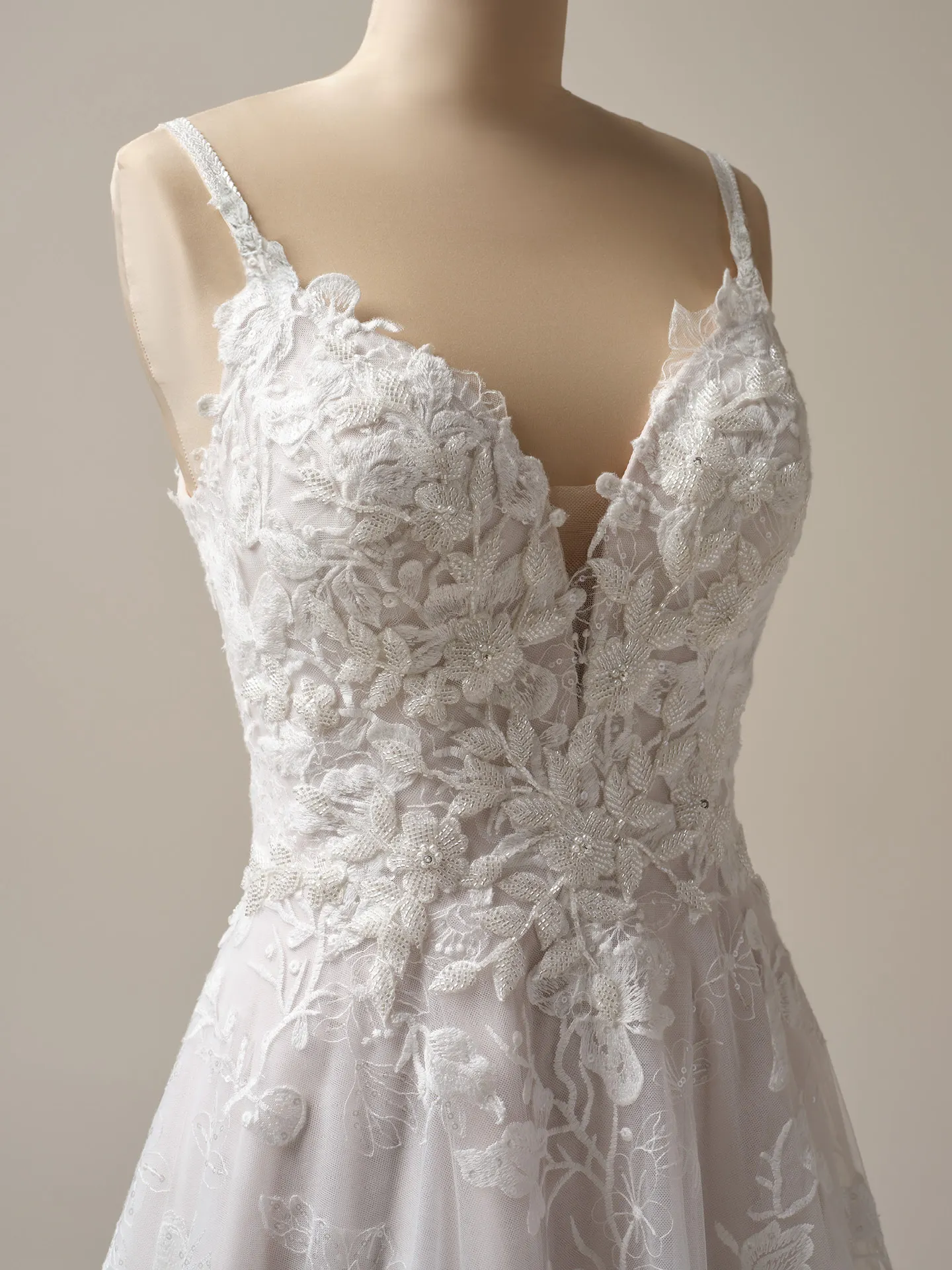 Maggie Sottero Jerrica A-line dress with floral lace detail, front view.