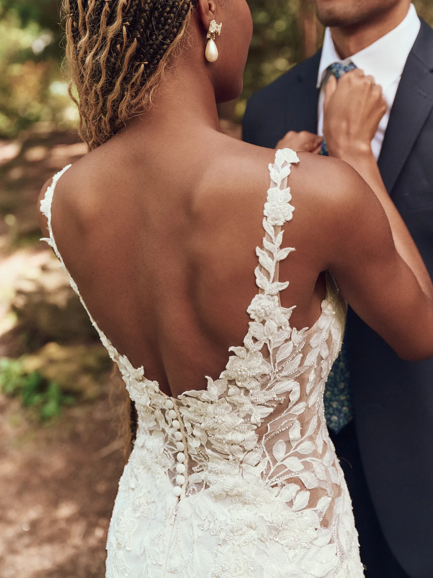 Keegan mermaid gown back view with lace floral details by Maggie Sottero