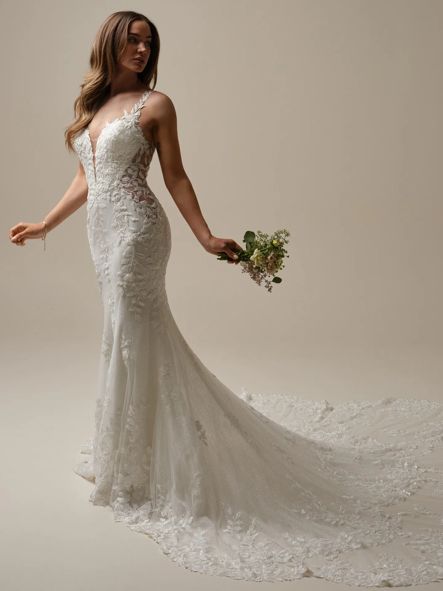 Maggie Sottero Keegan side view mermaid wedding gown with floral lace and illusion details