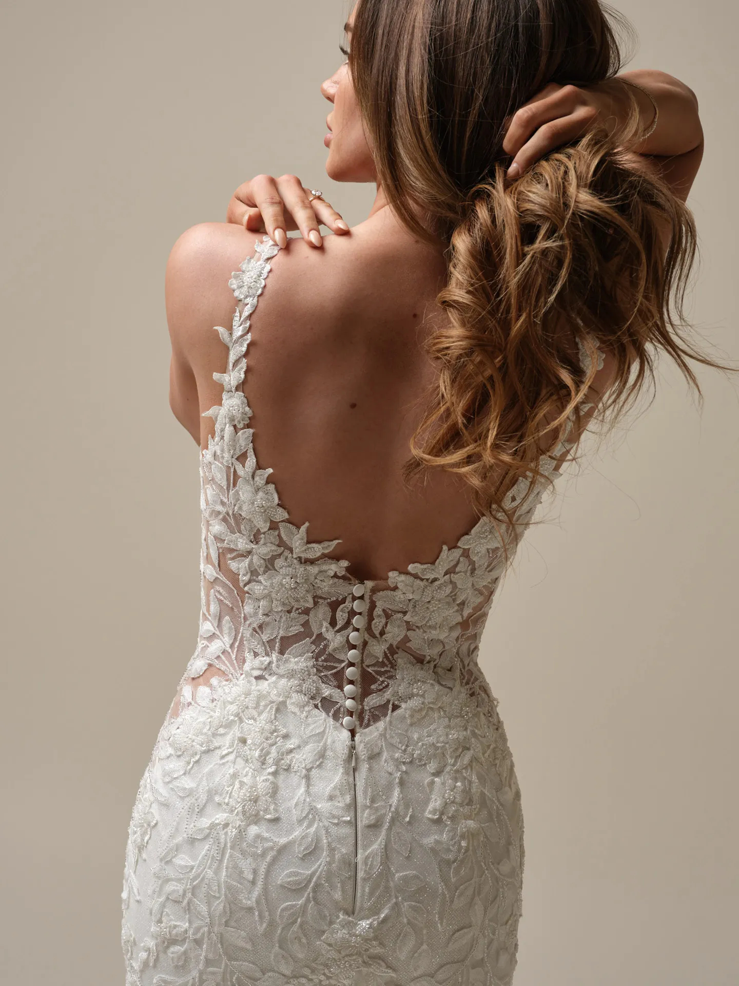 Keegan mermaid gown back view with floral lace detail and buttons by Maggie Sottero