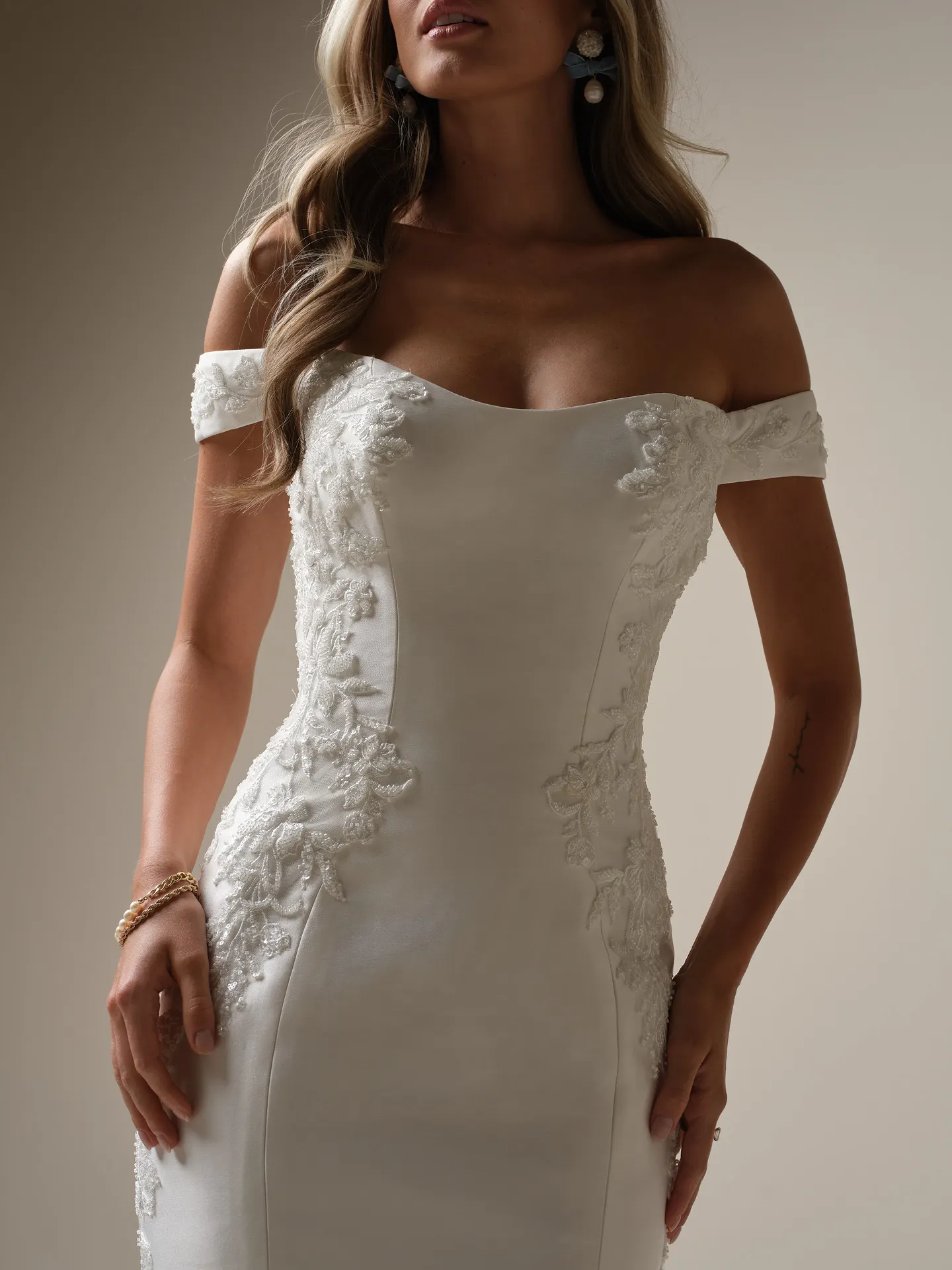 Loreen fit-and-flare dress, scoop neckline, off-shoulder, with floral lace. Front view.