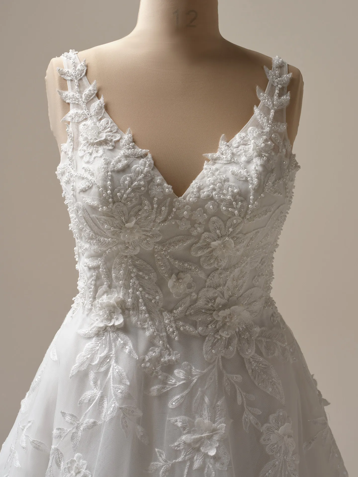 Maggie Sottero Magnolia front view 3-D lace A-line wedding dress with floral detail