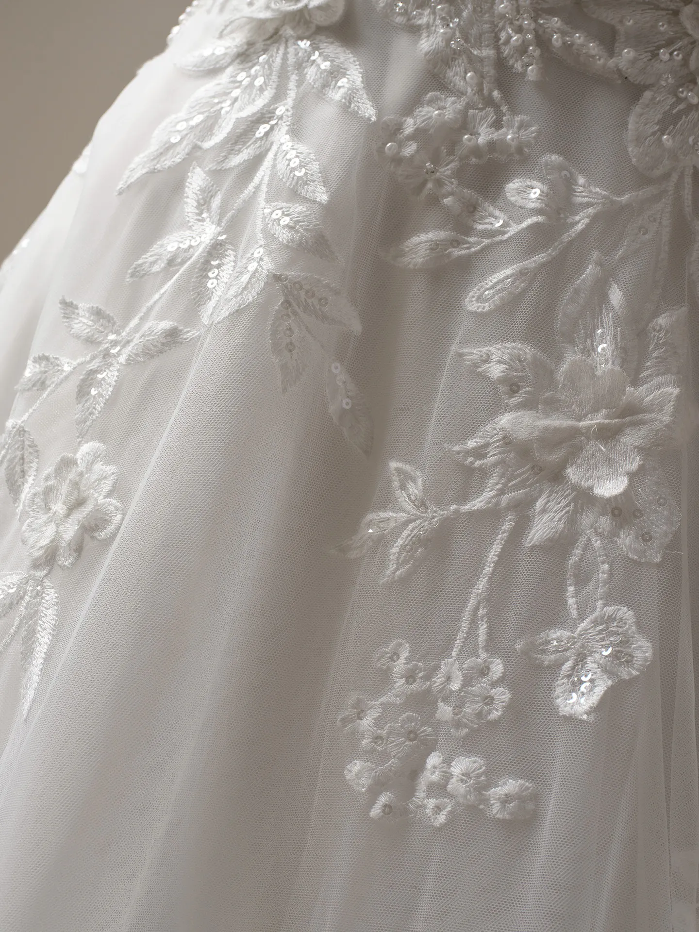 Maggie Sottero Magnolia 3-D lace detail on shimmering A-line gown.