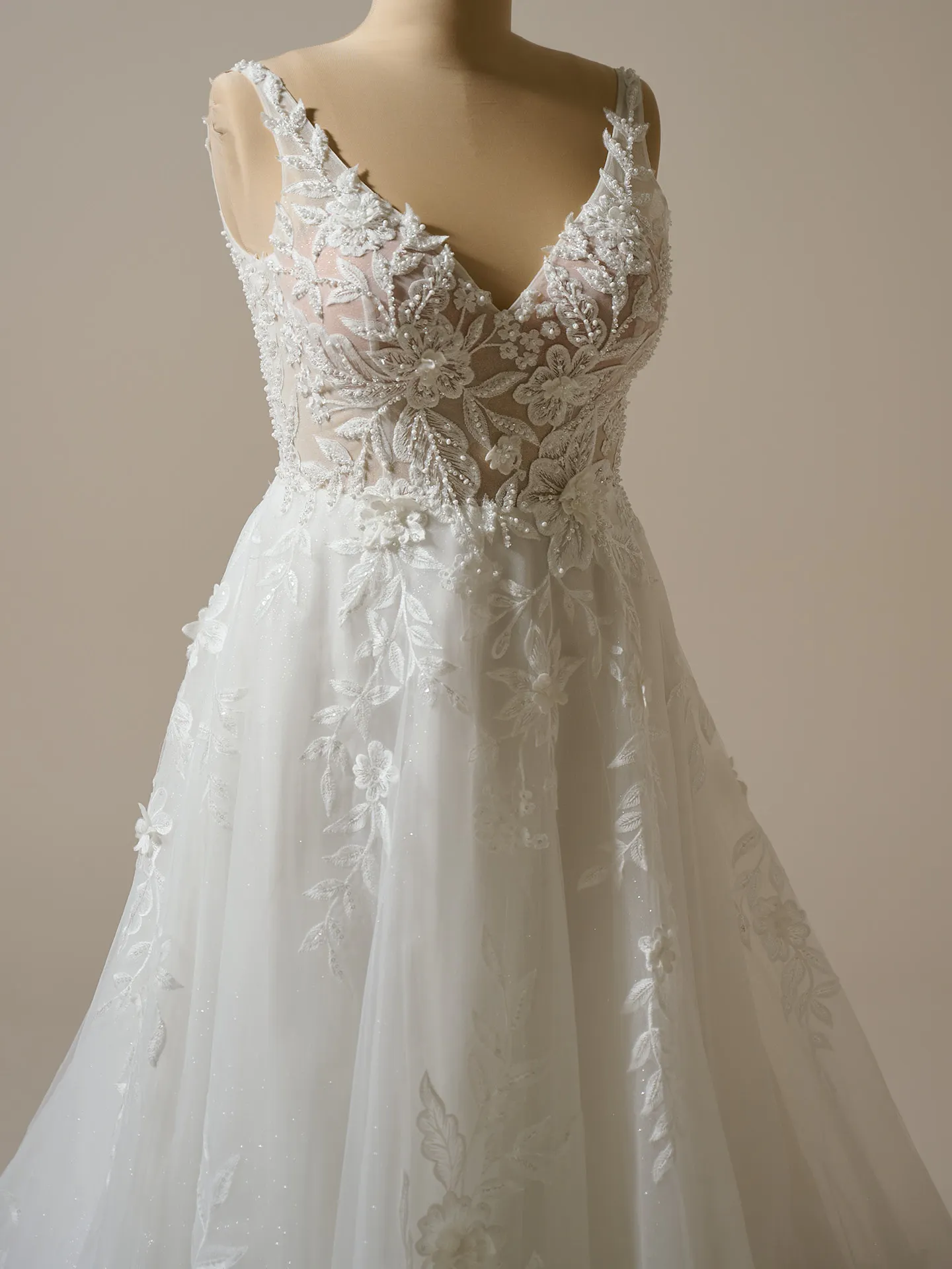 Maggie Sottero Magnolia front view A-line dress with 3-D lace and sparkle detailing