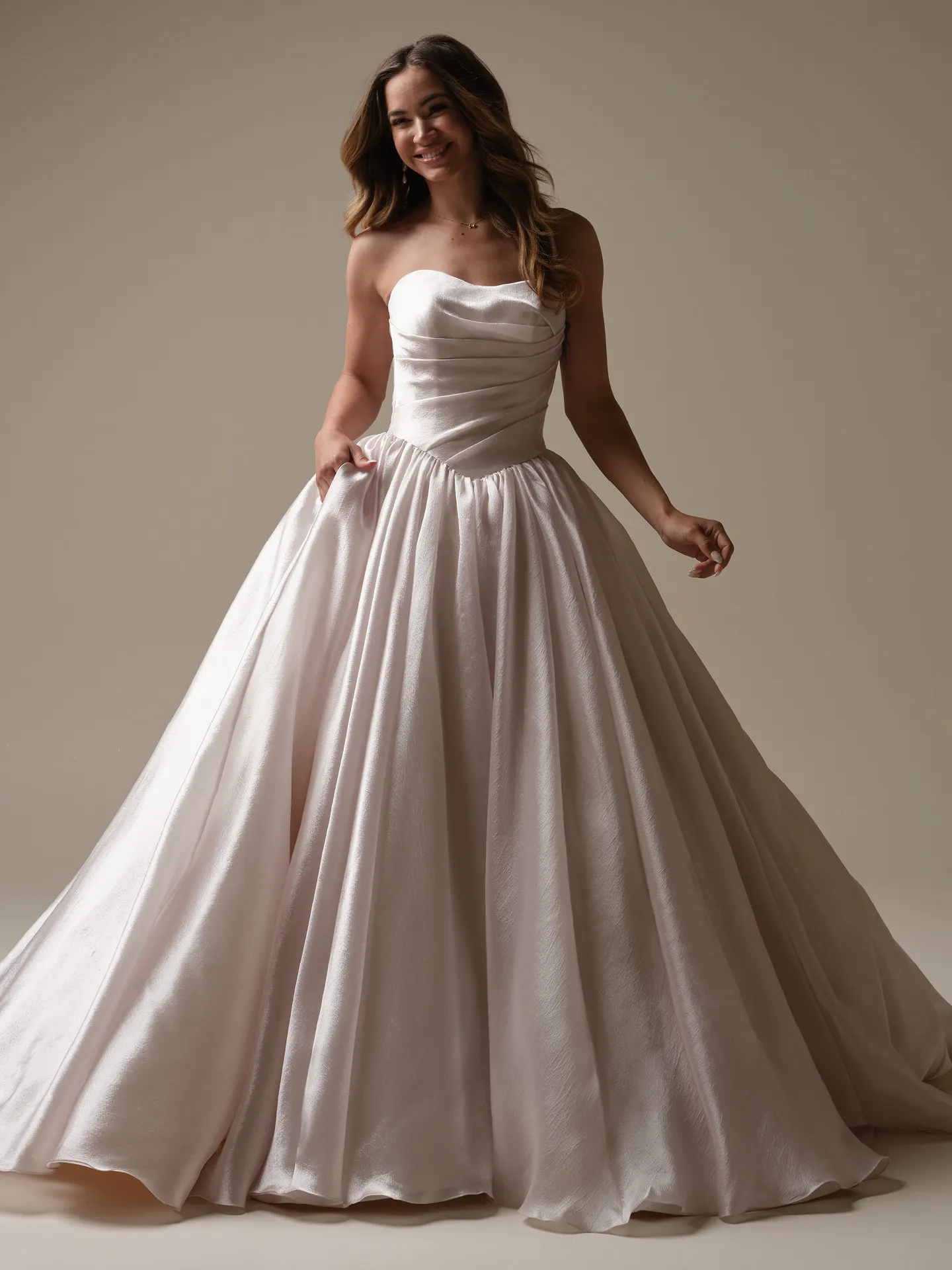 Maggie Sottero Paris front view asymmetrical basque waist bridal dress
