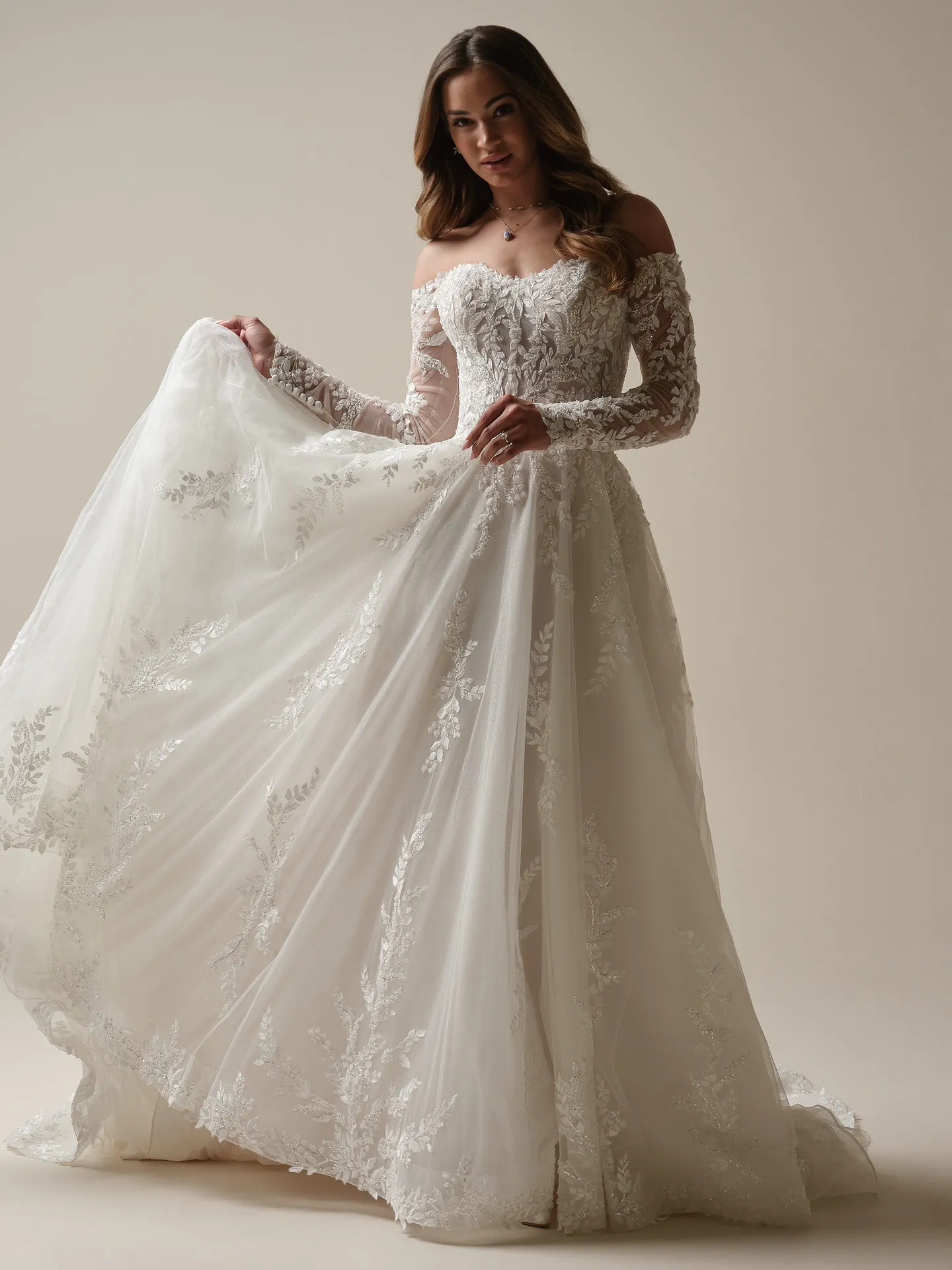Rita front view off-shoulder beaded A-line gown by Maggie Sottero