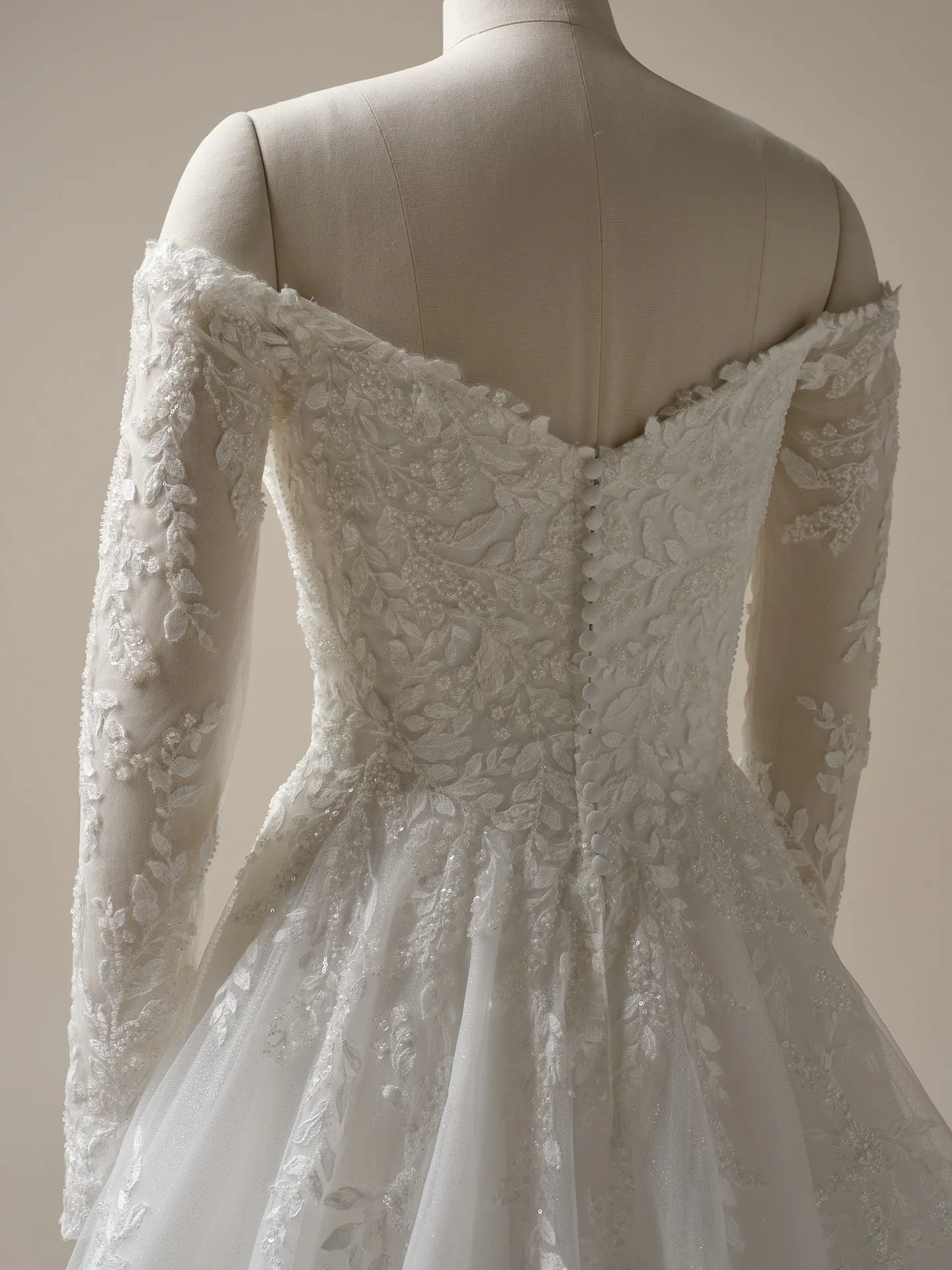 Maggie Sottero Rita back view off-shoulder beaded lace A-line bridal gown