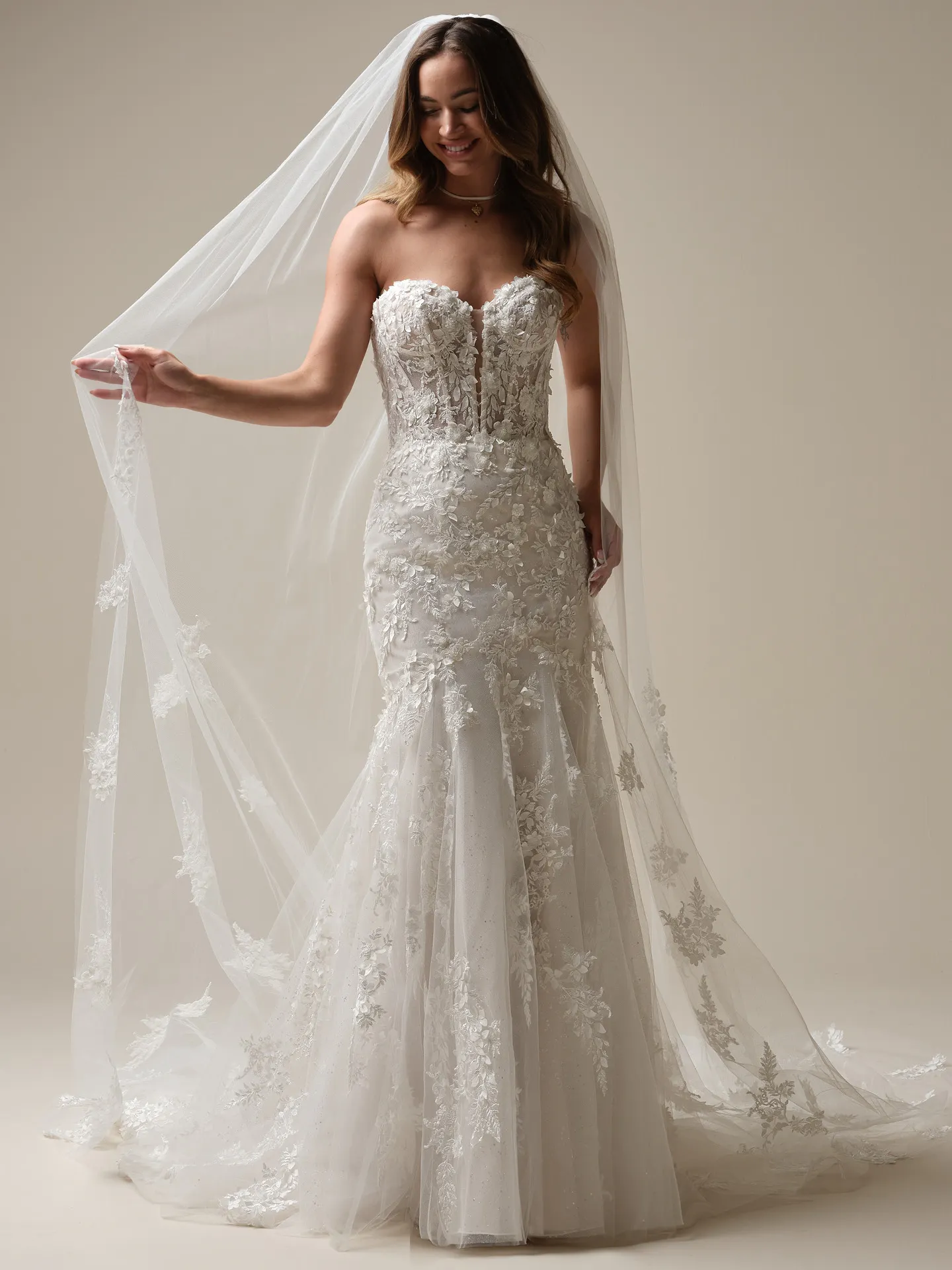 Maggie Sottero Roberta front view with cathedral veil and embellished flowers
