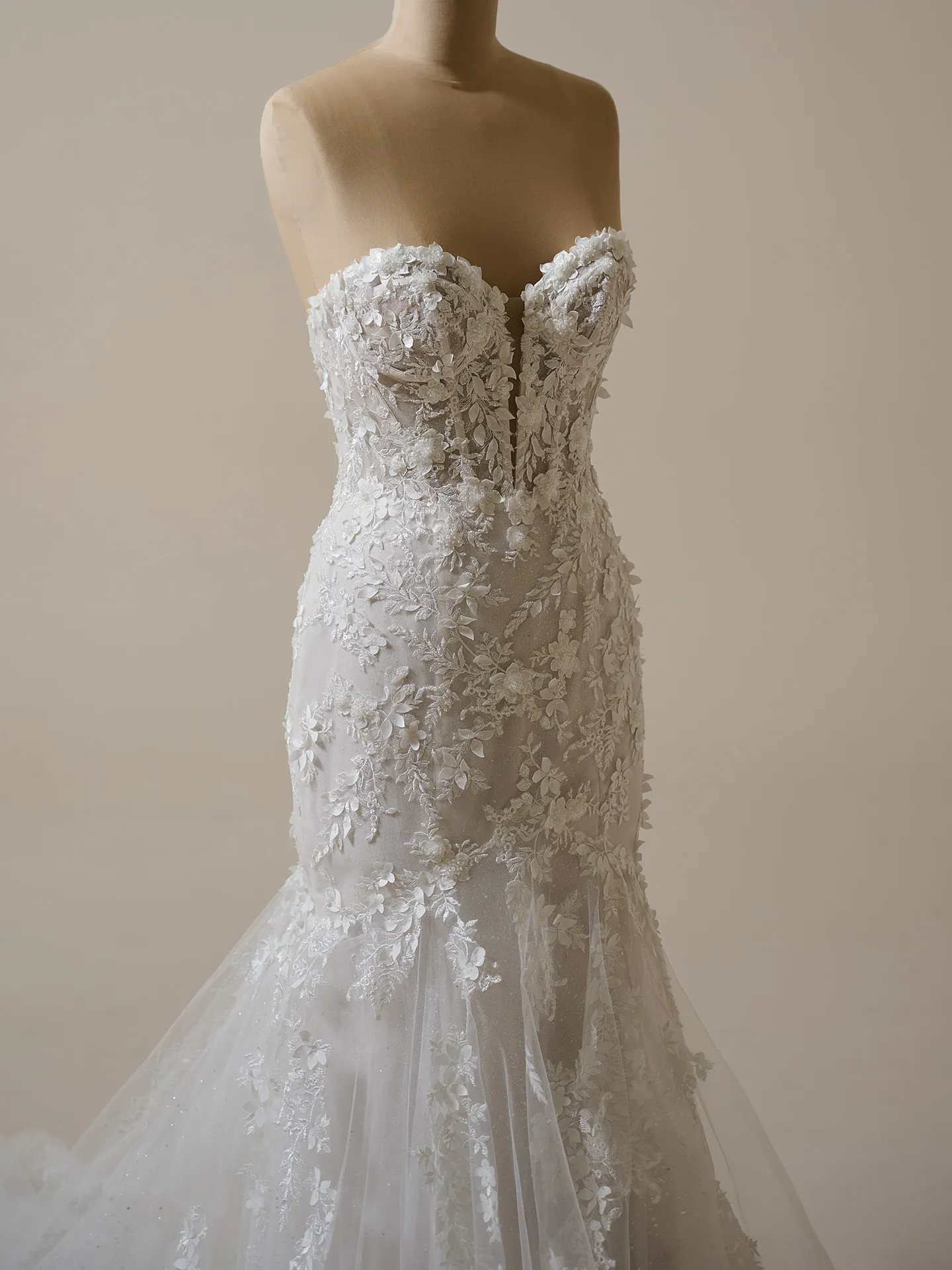 Maggie Sottero Roberta front view fit-and-flare lace wedding dress with exposed boning.