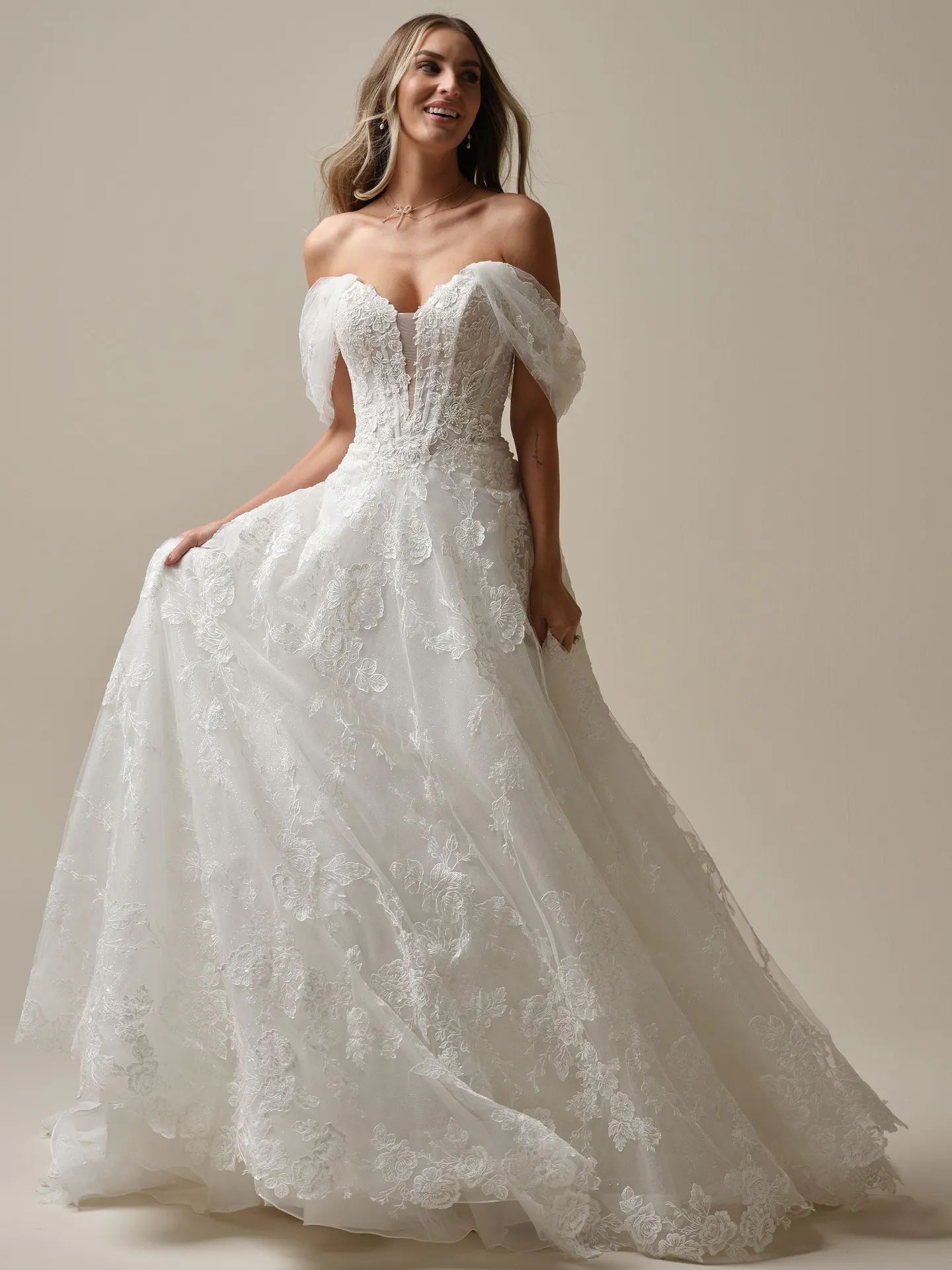 Maggie Sottero Skylar front view lace wedding dress with detachable cap sleeves