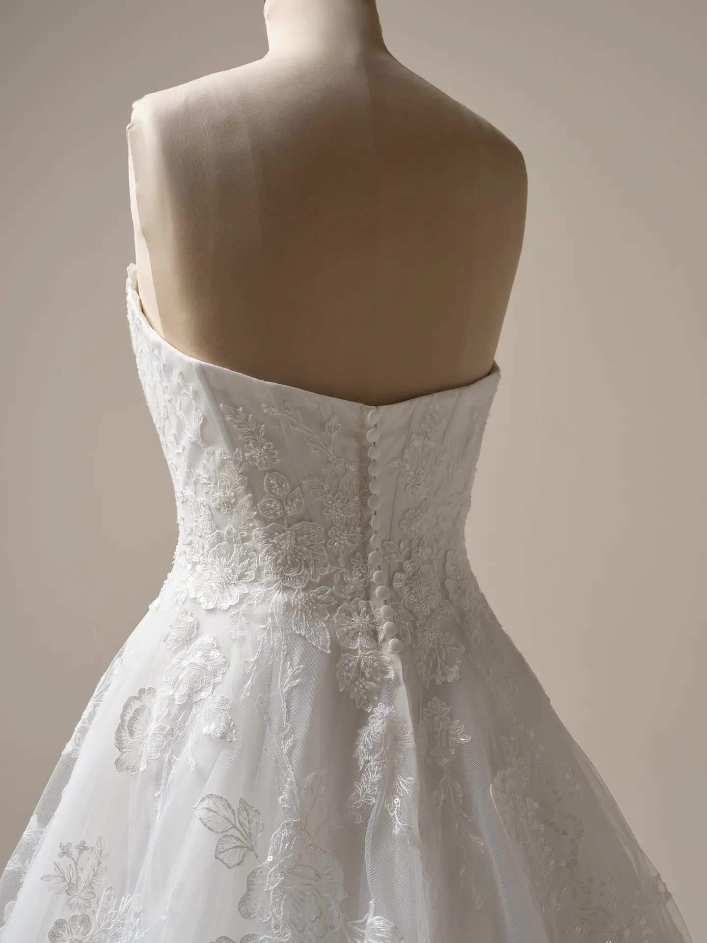Maggie Sottero Skylar back view with lace floral details
