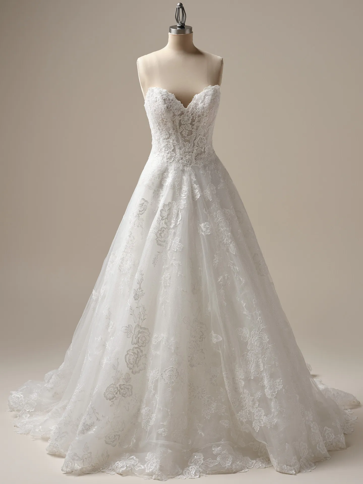 Maggie Sottero Skylar front view, lace A-line bridal gown on mannequin.