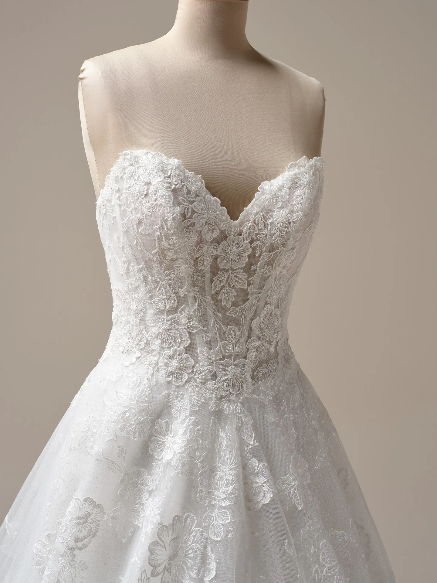 Maggie Sottero Skylar lace detail close-up, A-line bridal gown.