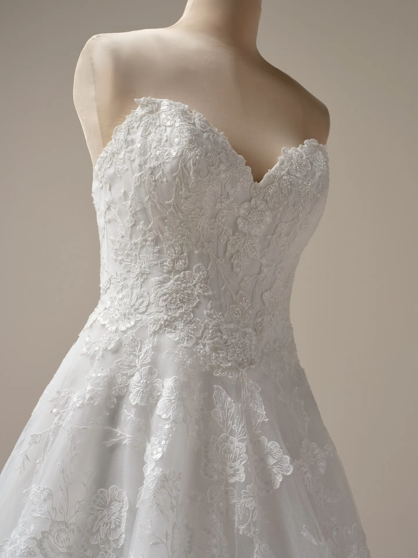 Maggie Sottero Skylar front view A-line bridal gown with lace floral details