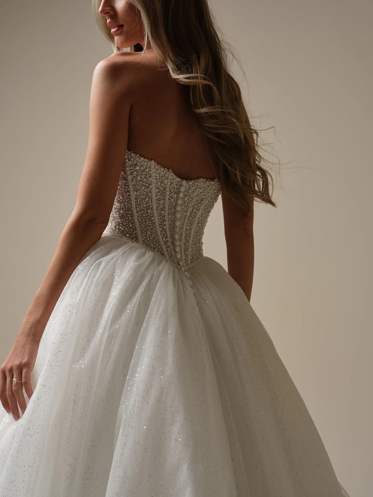 Maggie Sottero Tina Lane back view pearl beaded ball gown