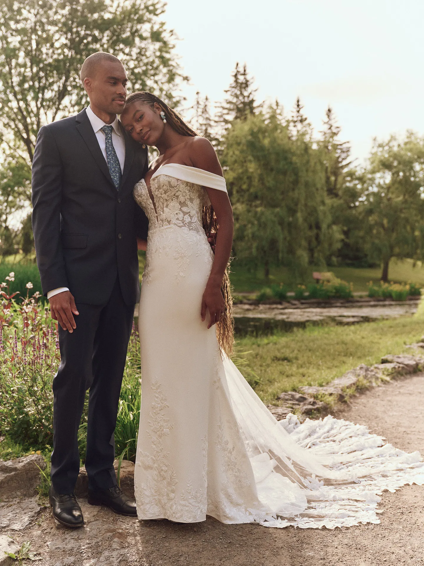 Yara plunging illusion crepe sheath bridal dress front view outdoors