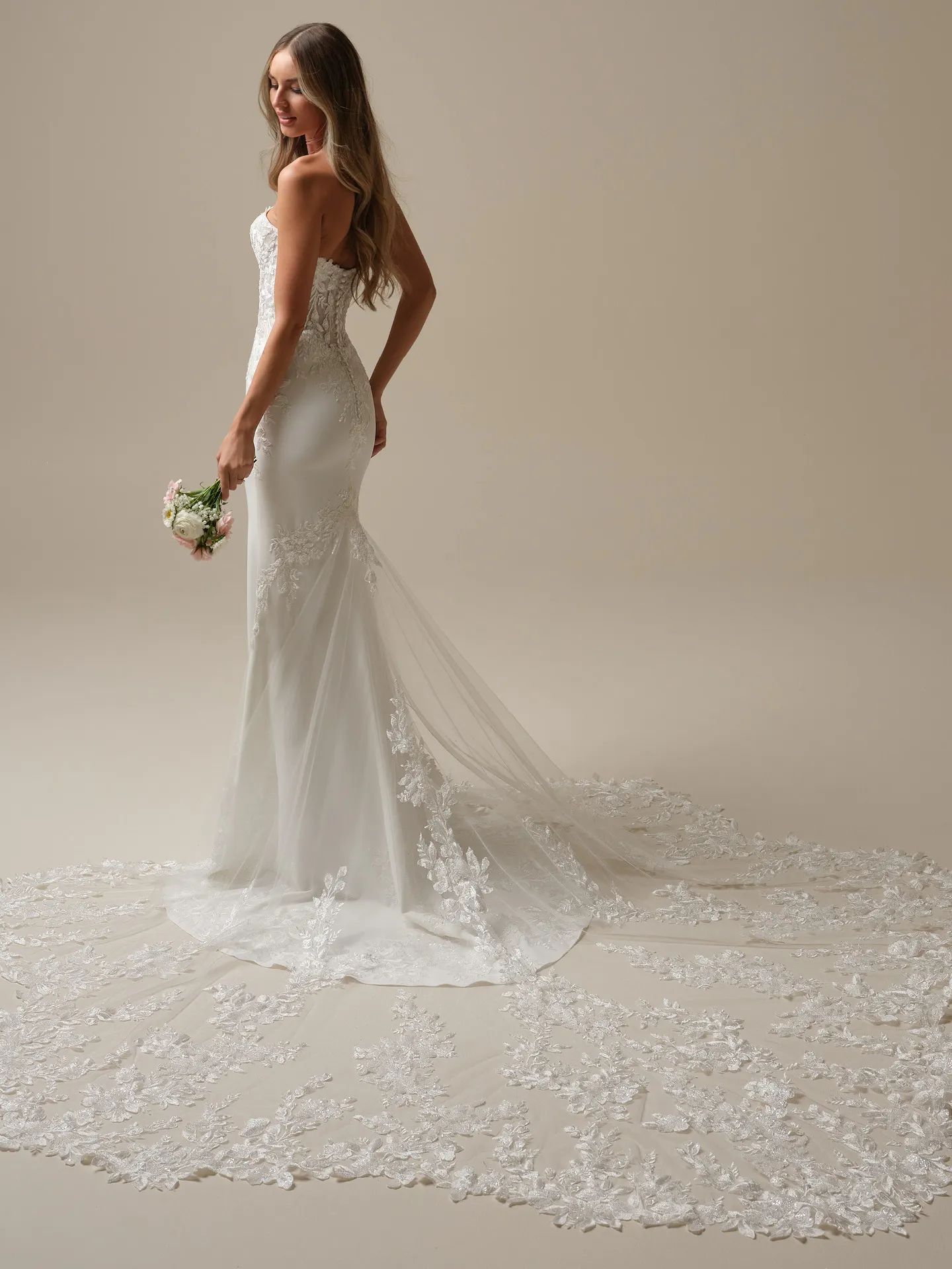 Yara plunging illusion crepe sheath bridal dress side view with lace train Maggie Sottero