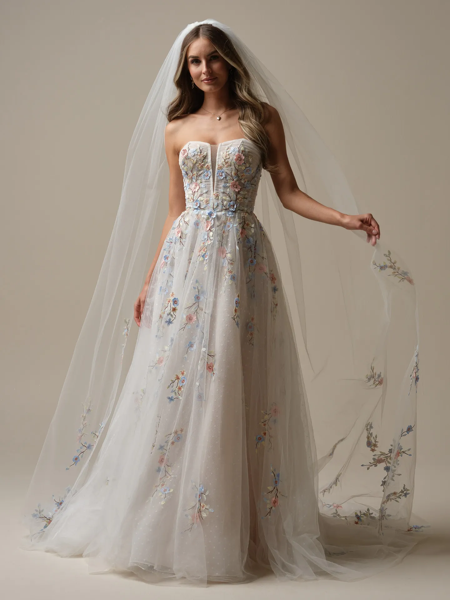 Maggie Sottero Zephyrine front view; colorful lace chapel length veil