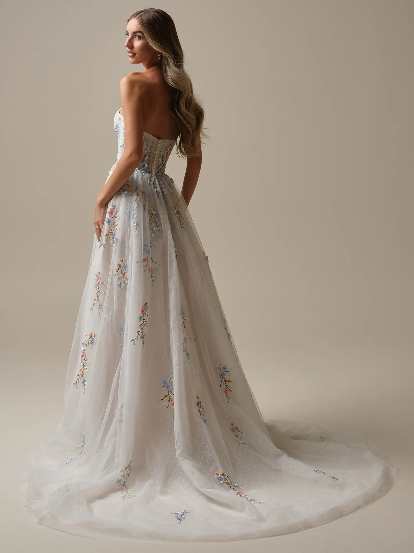 Maggie Sottero Zephyrine back view floral A-line gown
