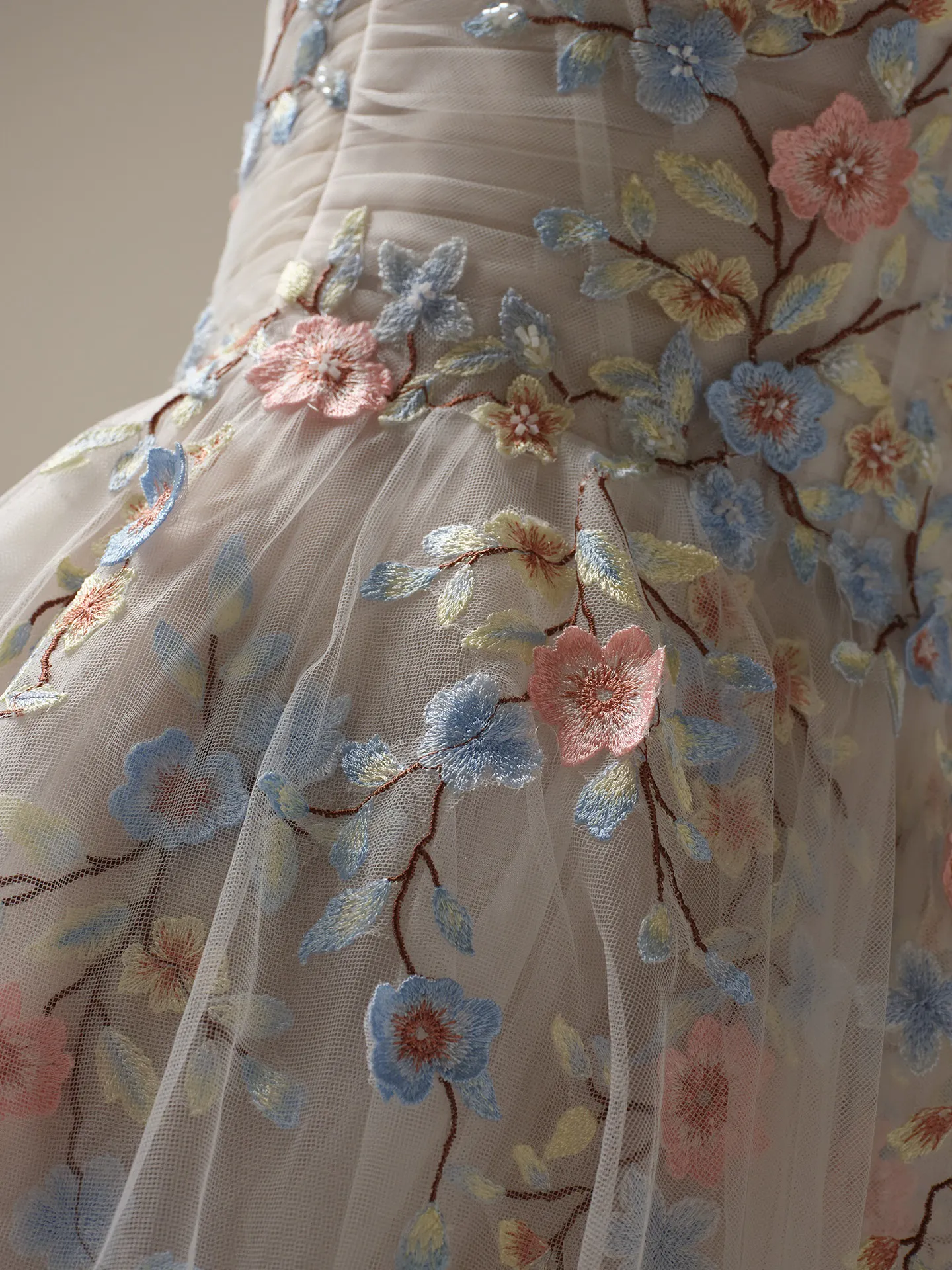 Maggie Sottero Zephyrine floral embroidery detail on A-line wedding gown