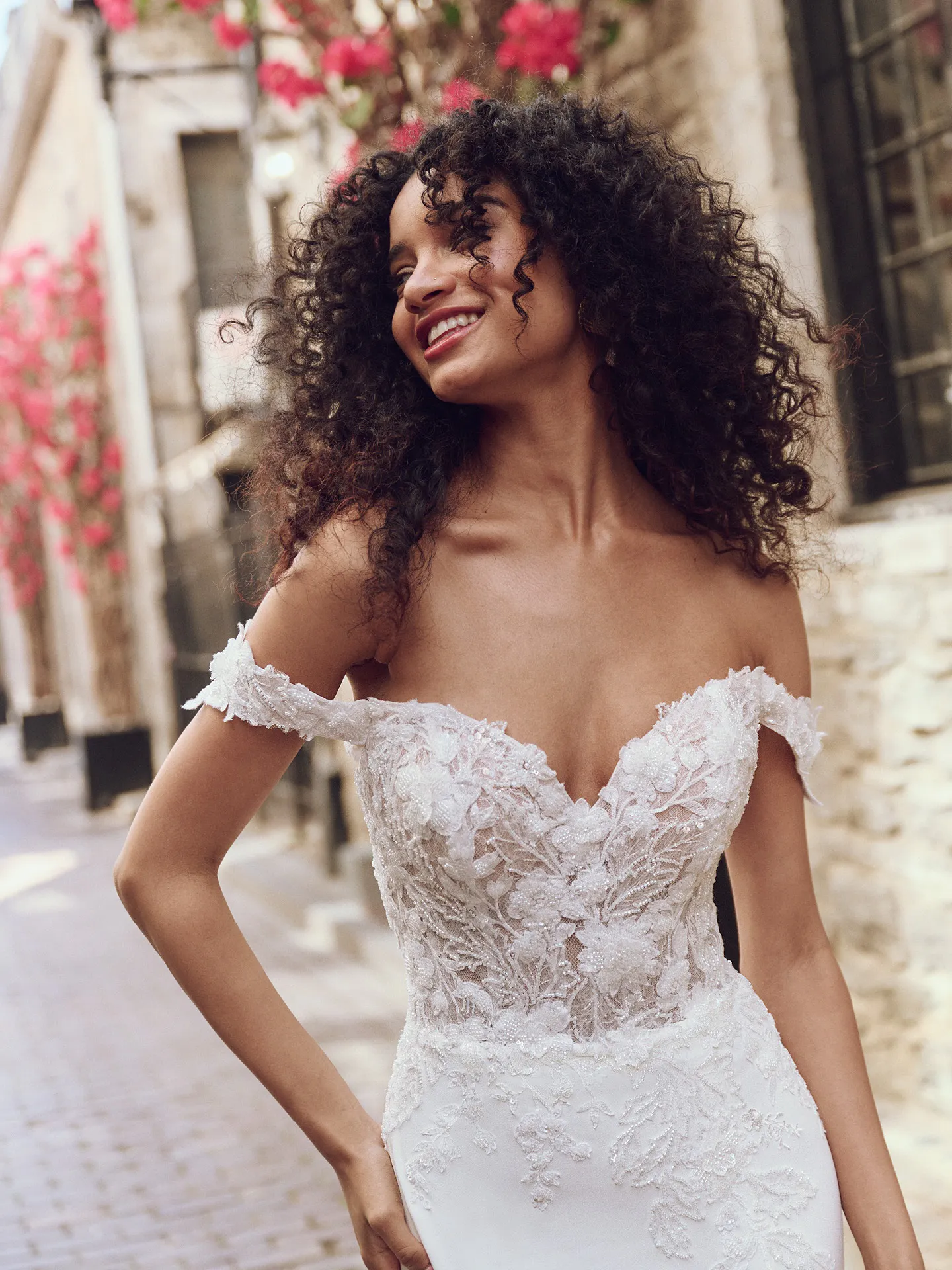 Maggie Sottero Adeline front view lace sheath with floral details outdoors
