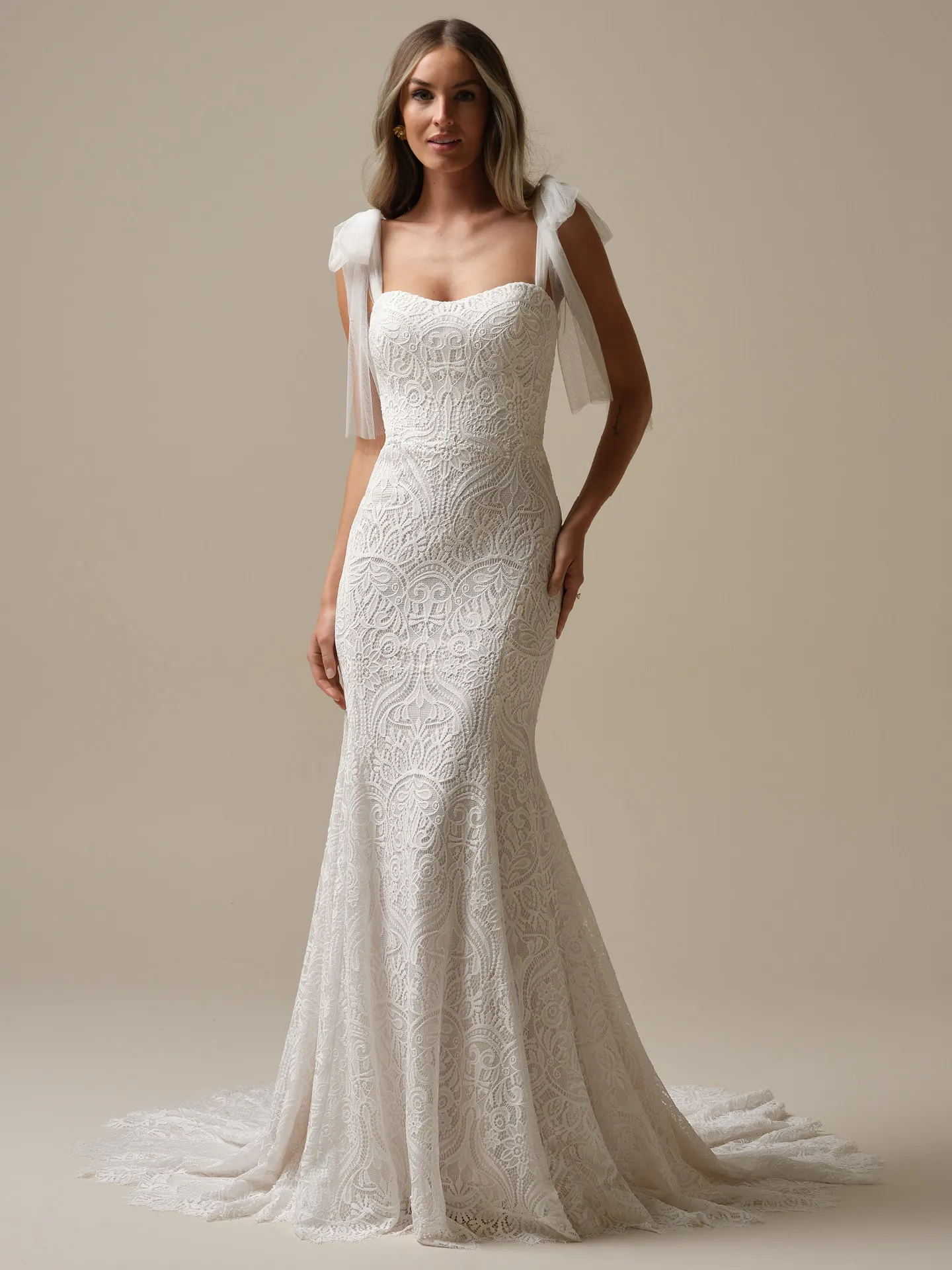 Maggie Sottero Berkeley lace sheath wedding dress front view.