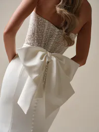 Flirty and fun stretch satin detachable bow