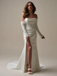 Long sleeves with draped detail and button closure
