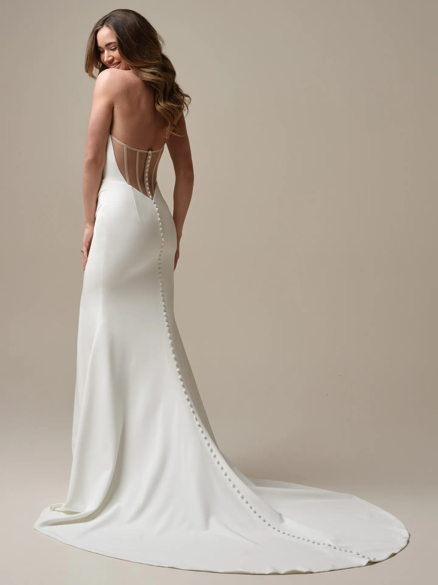 Kailani crepe cowl back view Maggie Sottero wedding dress with button detail