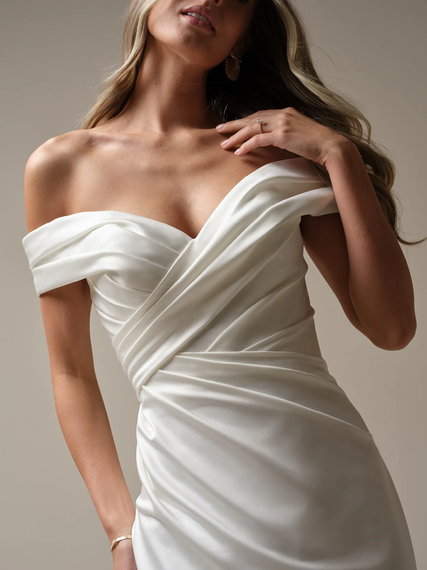 Maggie Sottero Latoya front view asymmetrical mermaid dress in satin
