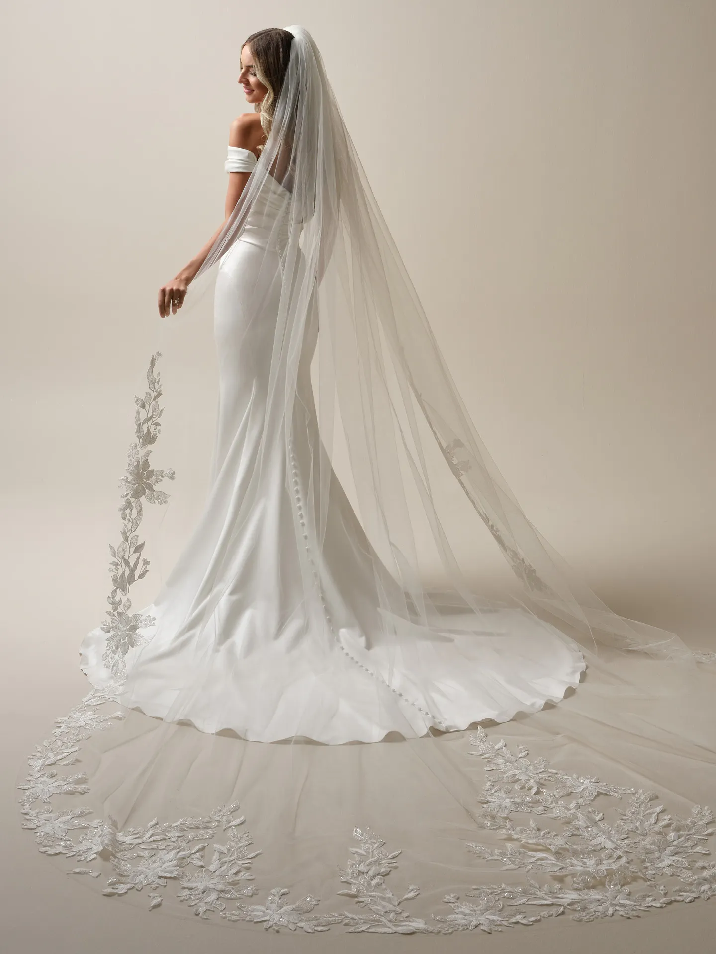 Maggie Sottero dress back view with Latoya veil and beaded edge