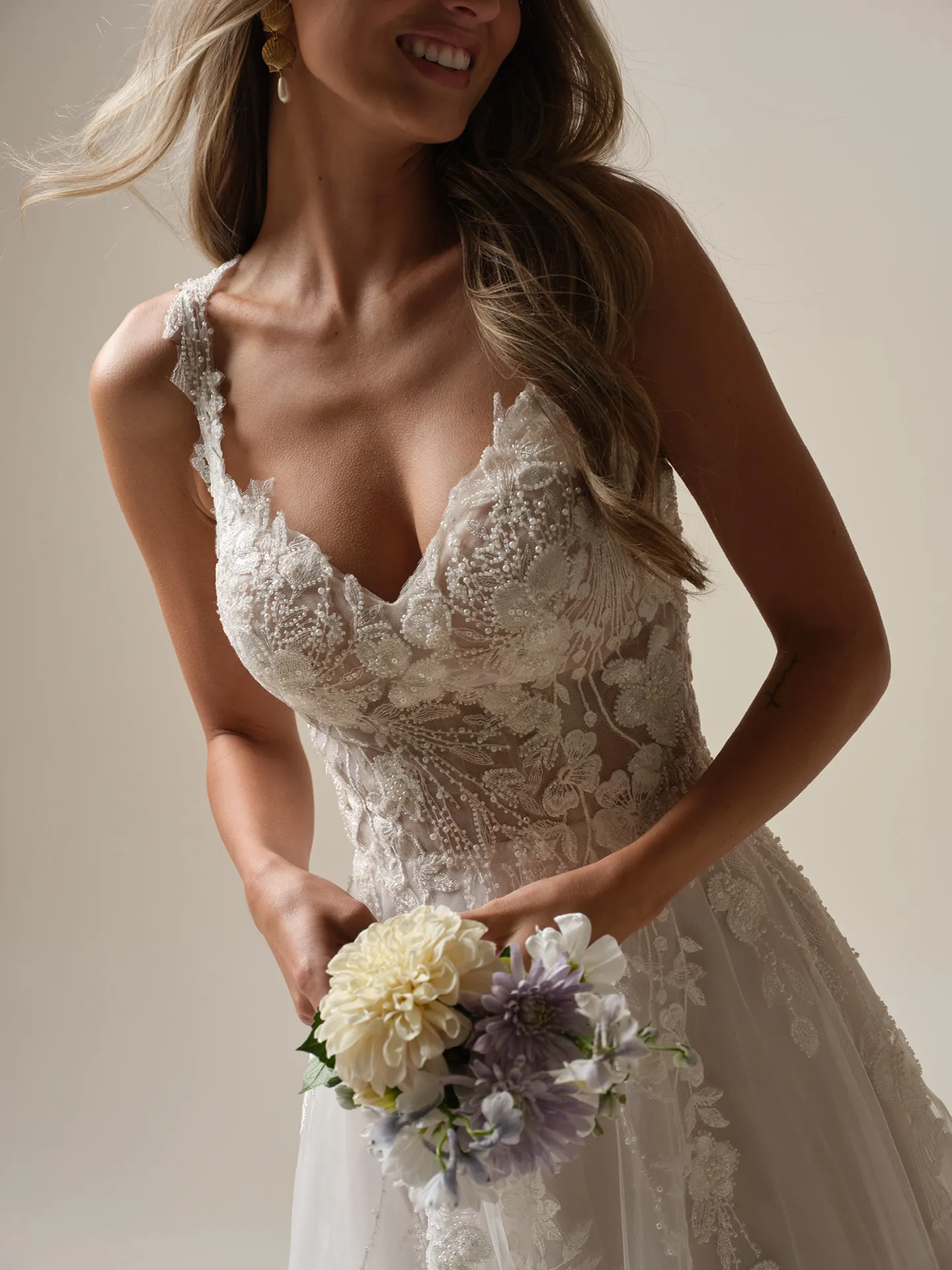 Rebecca Ingram Maple beaded floral lace V-neck A-line bridal gown front view