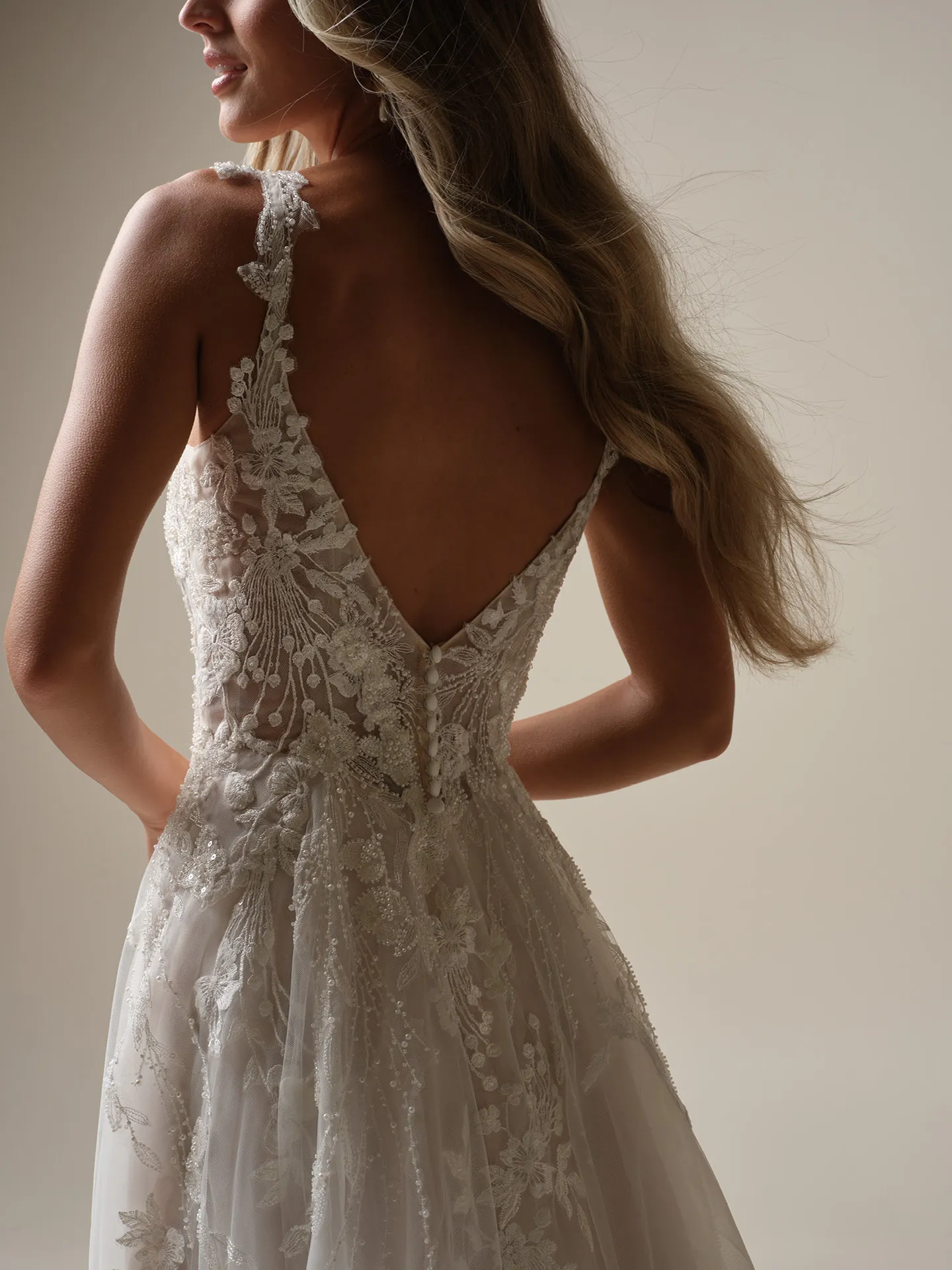 Rebecca Ingram Maple A-line bridal gown back view with beaded lace details.