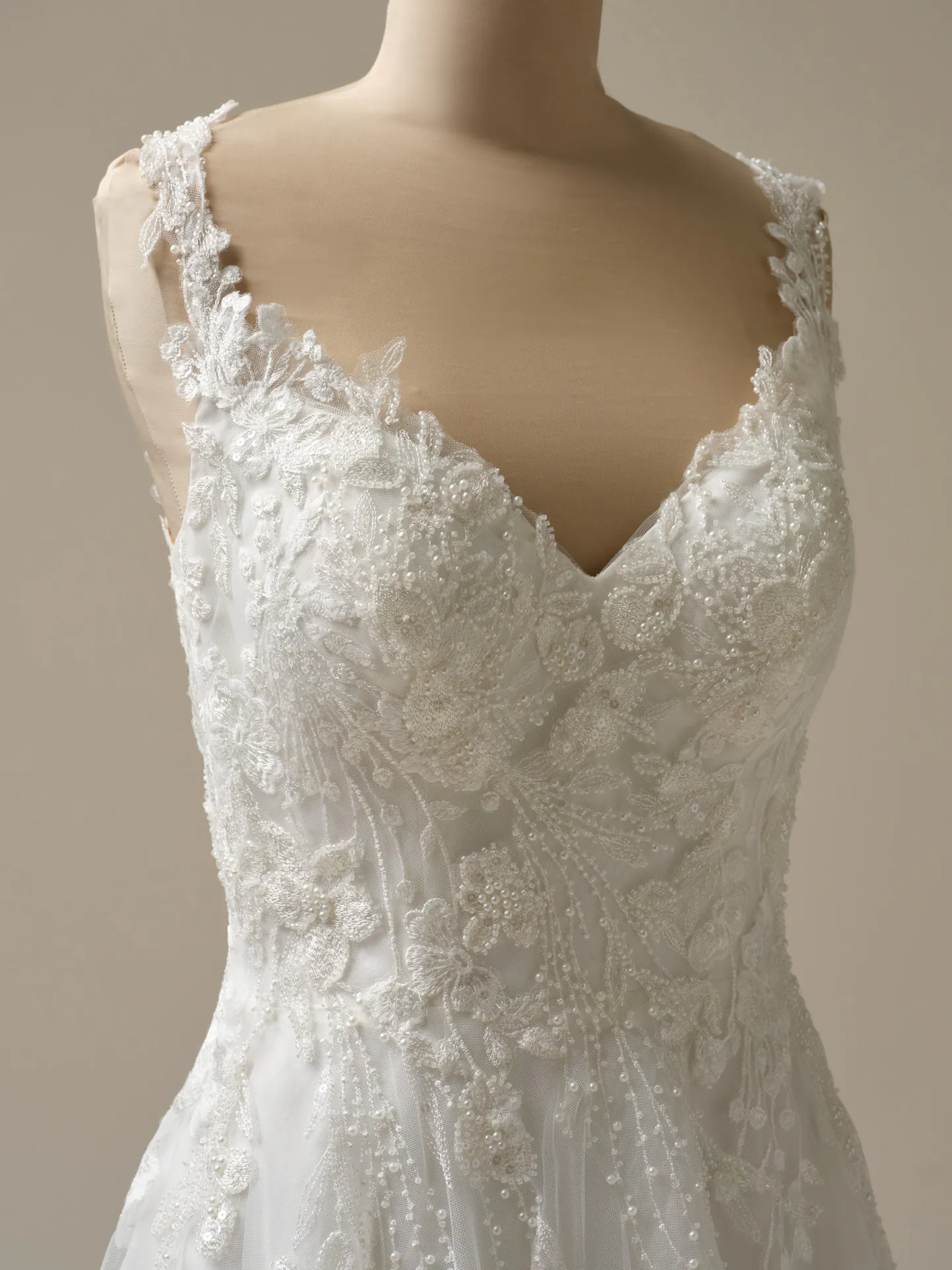 Rebecca Ingram Maple gown front view, beaded lace with pearl details on V-neck A-line.