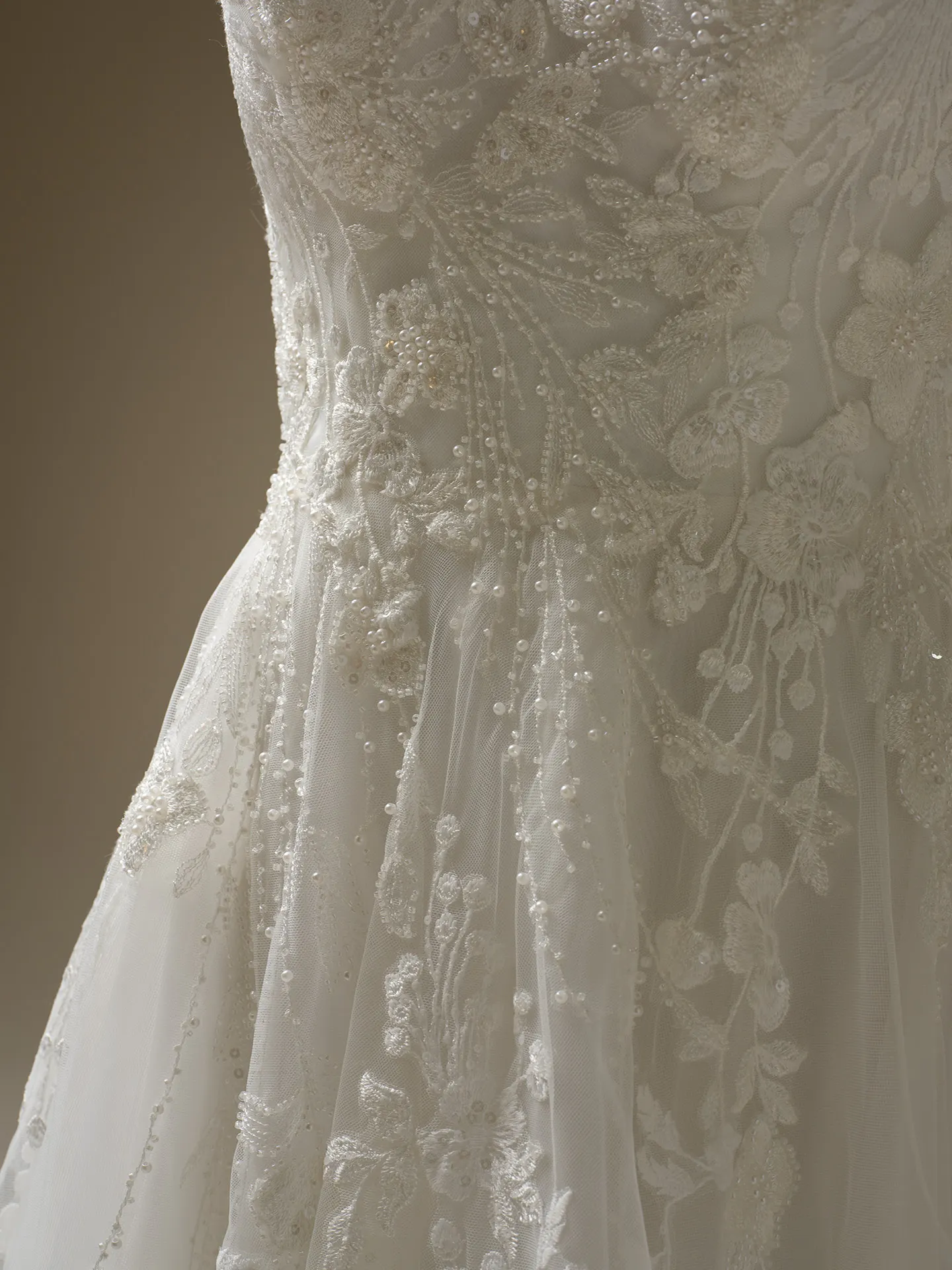 Rebecca Ingram Maple close-up, beaded lace detail on A-line gown