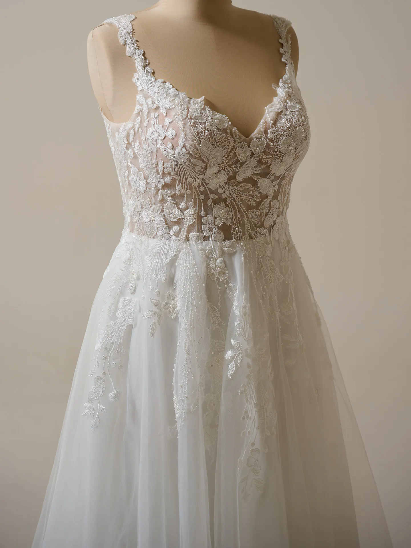 Rebecca Ingram Maple A-line bridal gown front view with beaded lace and pearl detailing