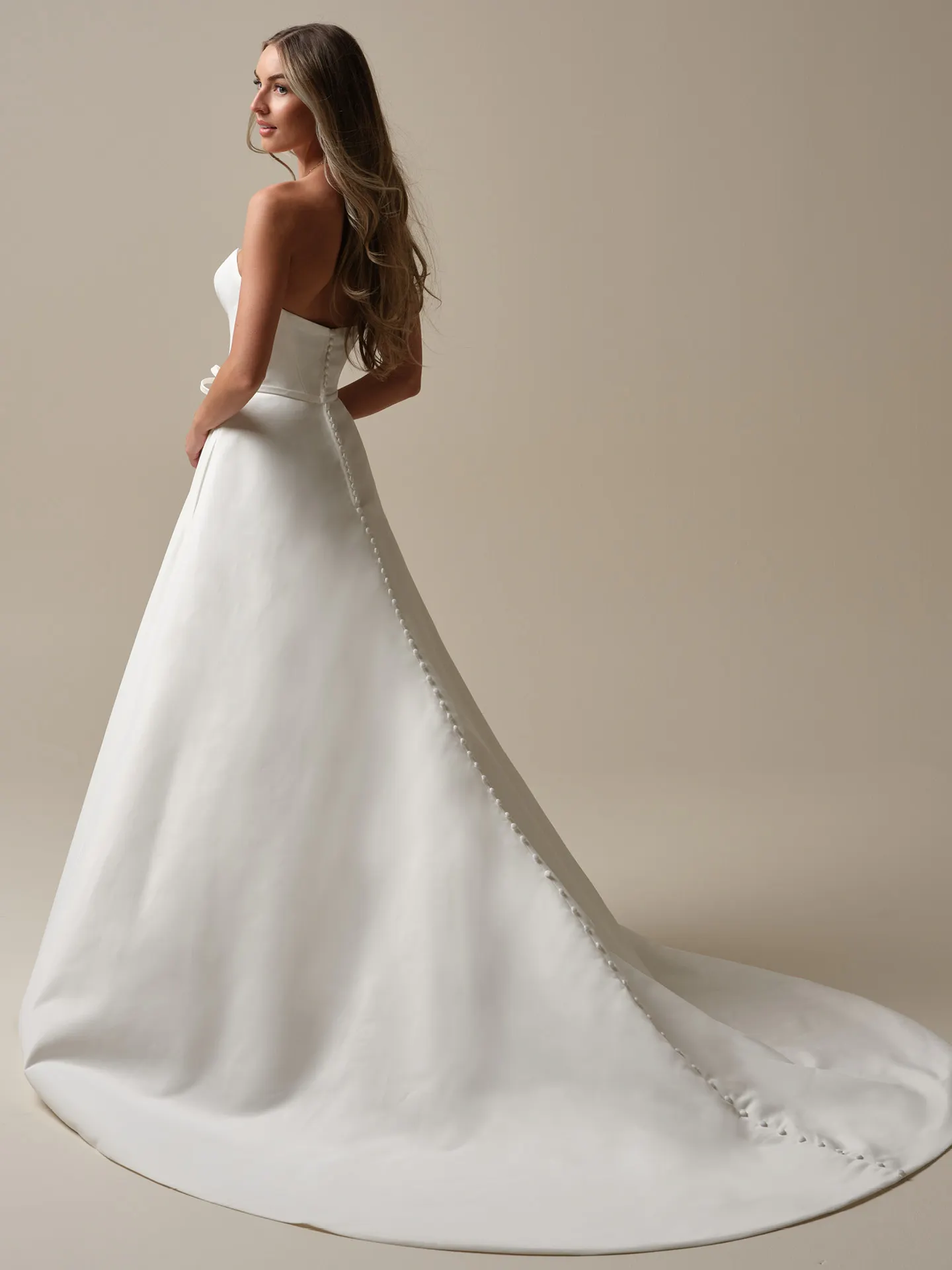 Rebecca Ingram Marsha Lane back view strapless satin A-line wedding dress