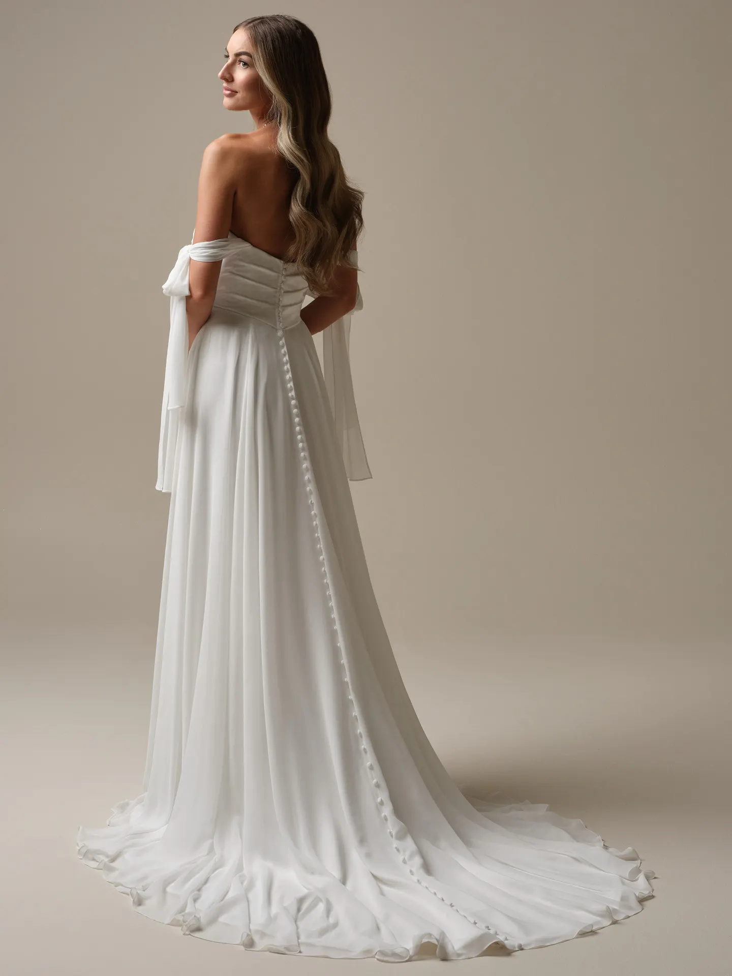 Rebecca Ingram Melody back view chiffon strapless A-line wedding dress