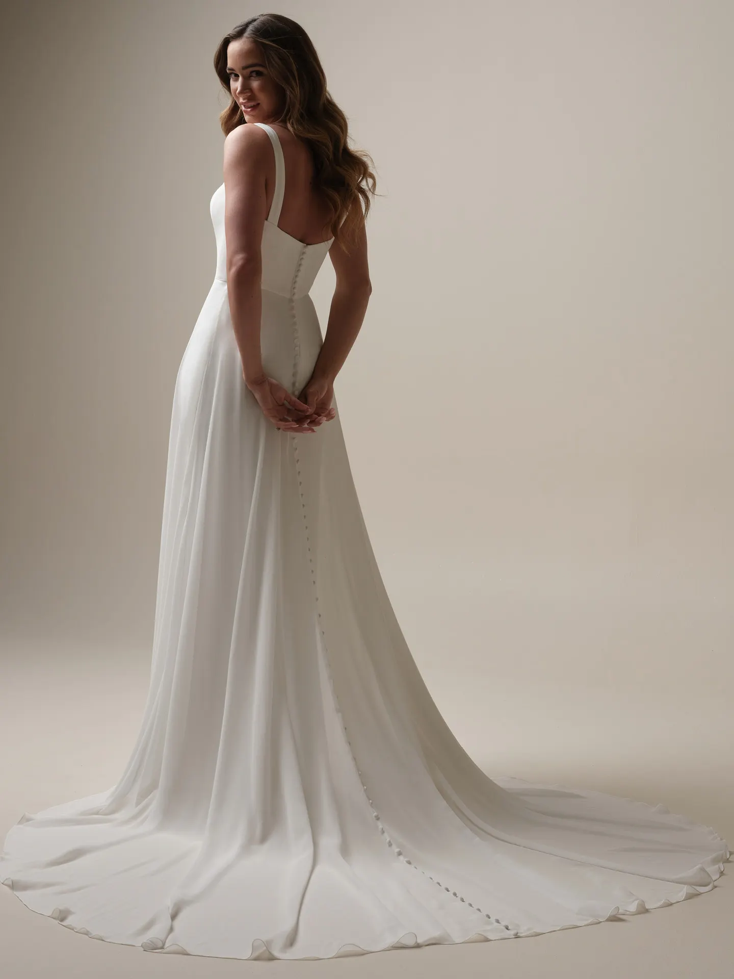 Rebecca Ingram Olivianna back view simple crepe A-line bridal dress