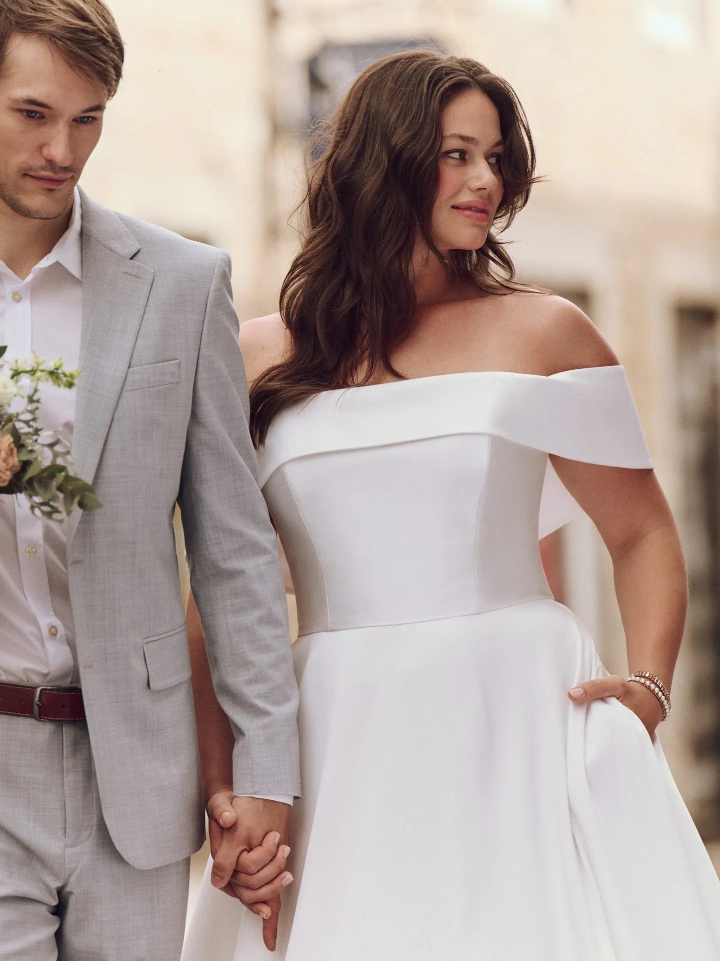 Maggie Sottero Perri Mikado A-line dress front view, off-shoulder banded cuff detail.