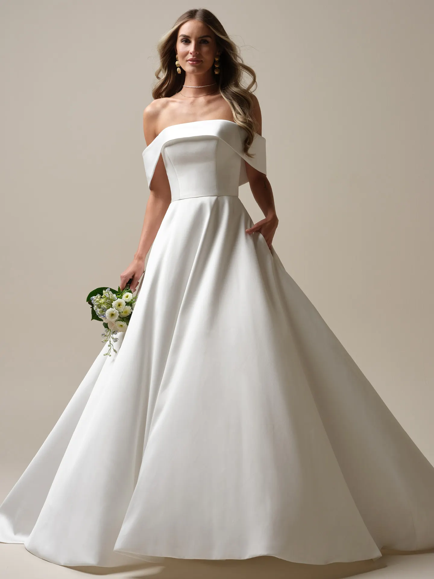 Maggie Sottero Perri A-line front view, off-the-shoulder bridal dress.