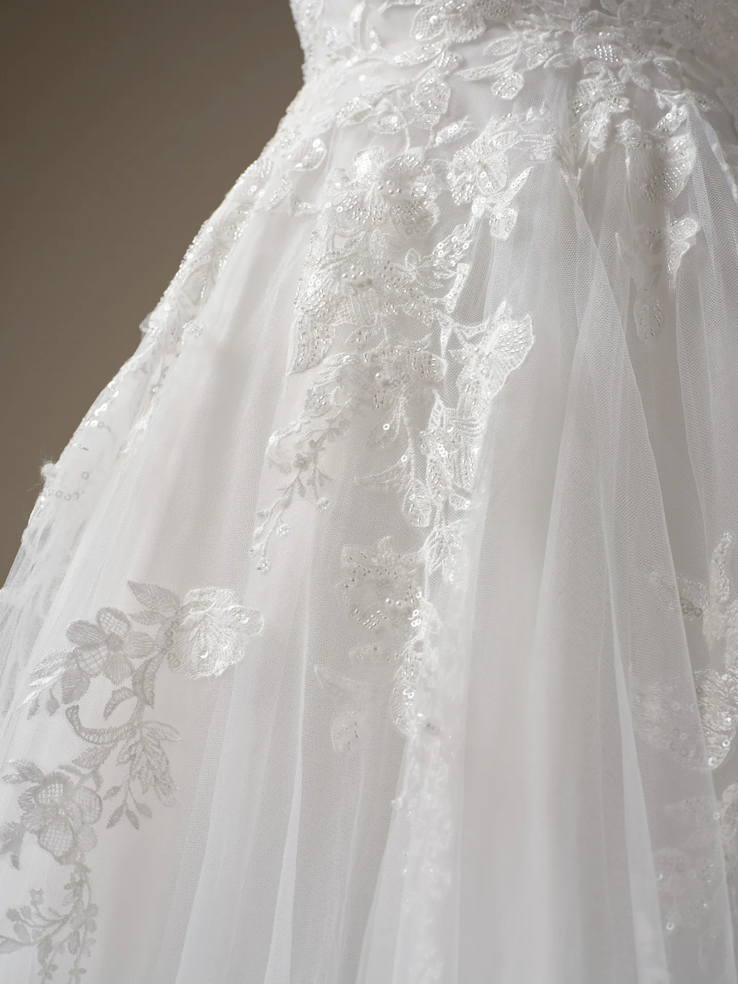 Maggie Sottero Rickie lace detail A-line gown close-up