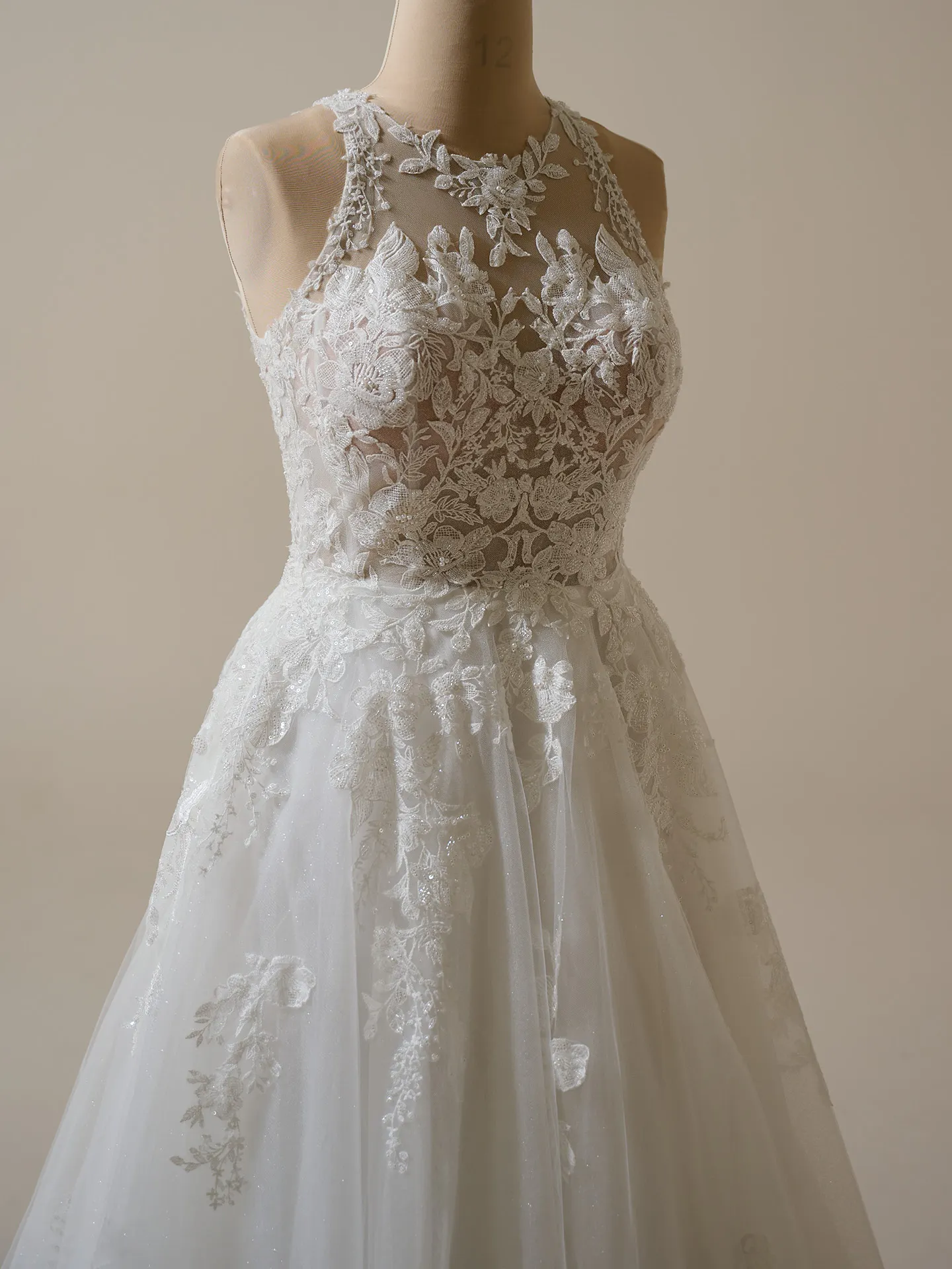 Maggie Sottero Rickie lace halter neck A-line gown front view