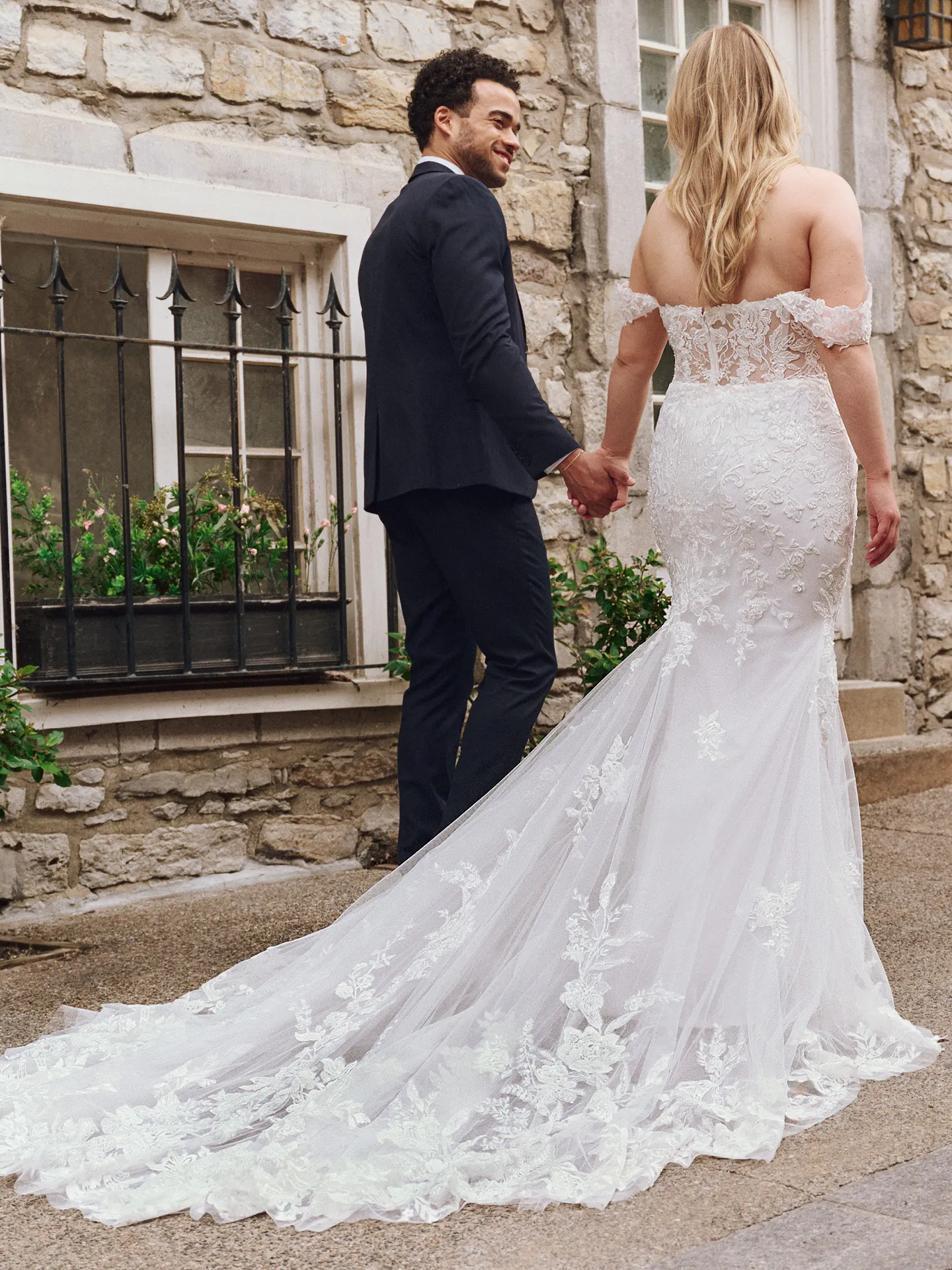 Tegan Mermaid dress back view, lace, outdoor stone setting, Maggie Sottero